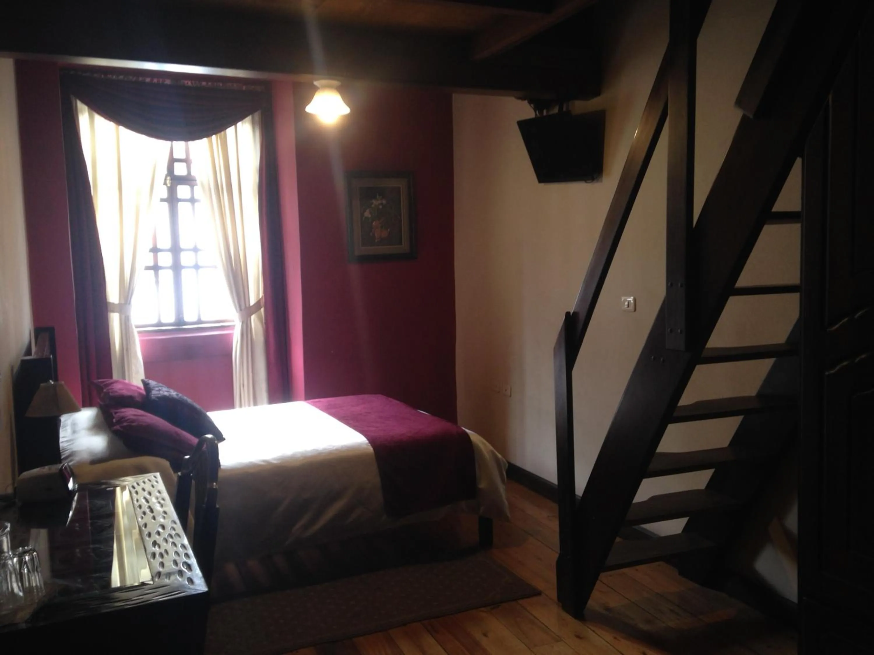 Photo of the whole room, Bed in La Posada Cuencana Hotel