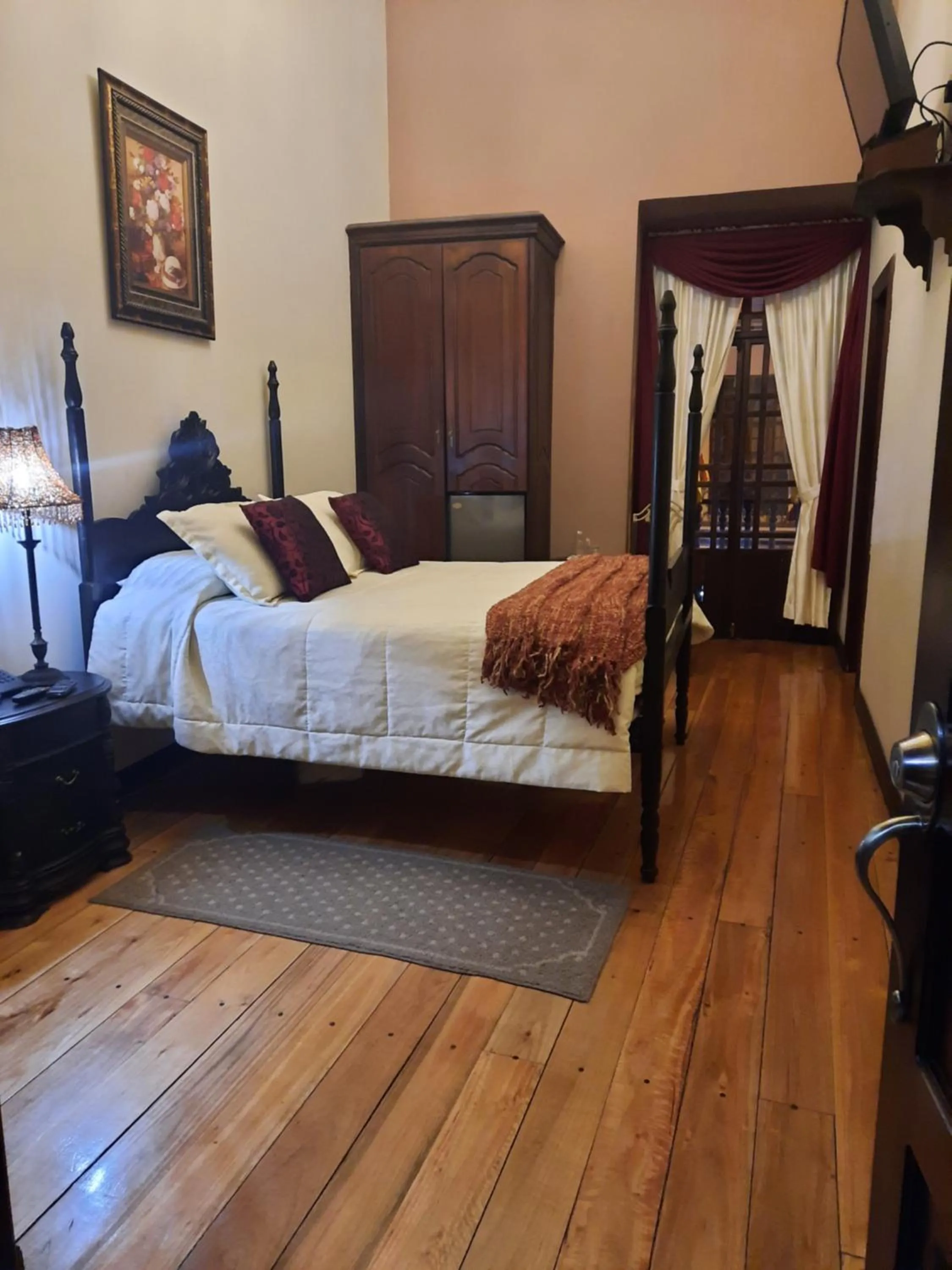 Photo of the whole room, Bed in La Posada Cuencana Hotel