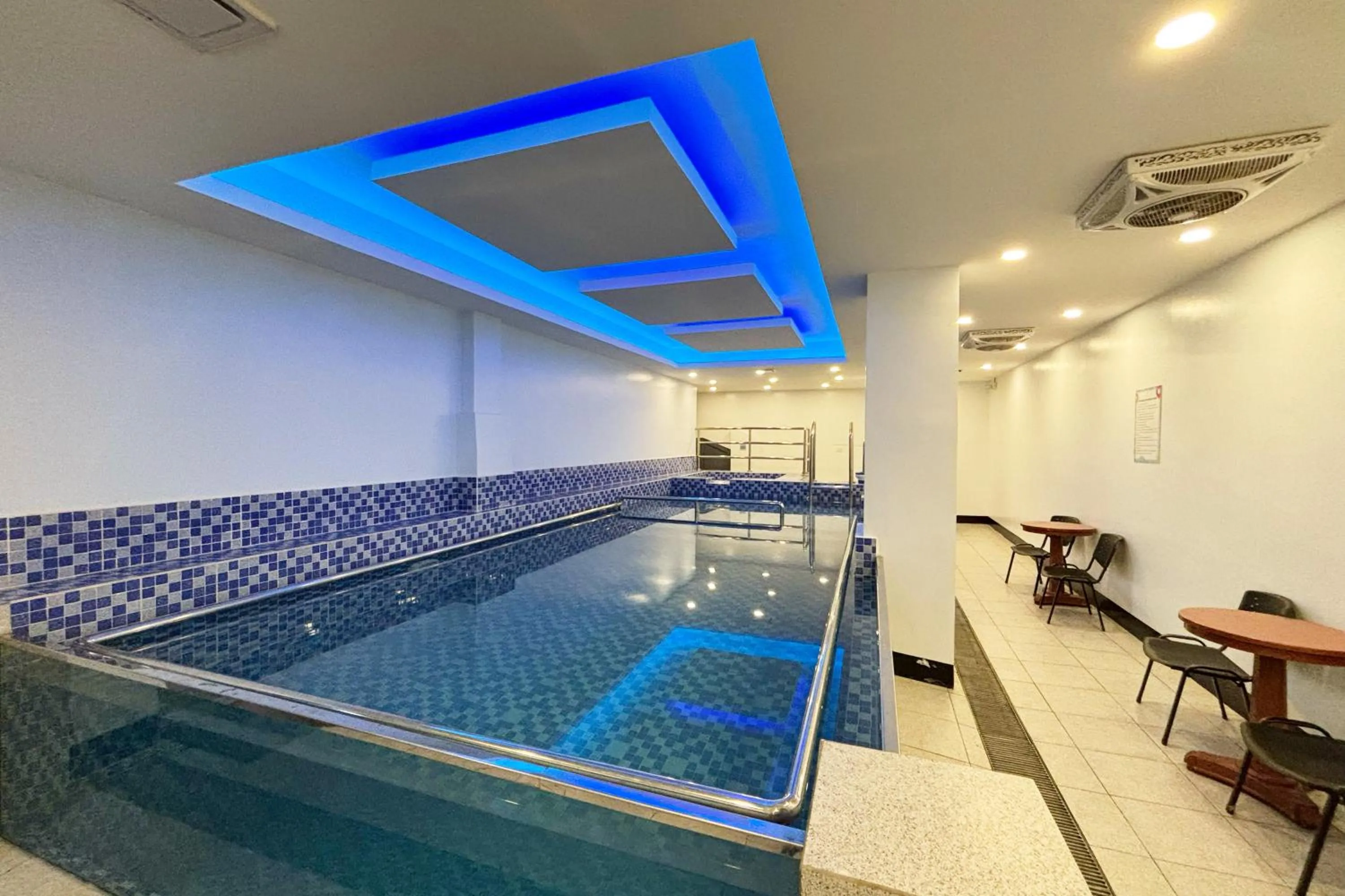 Swimming pool in Tiara Oriental Hotel Makati powered by Cocotel