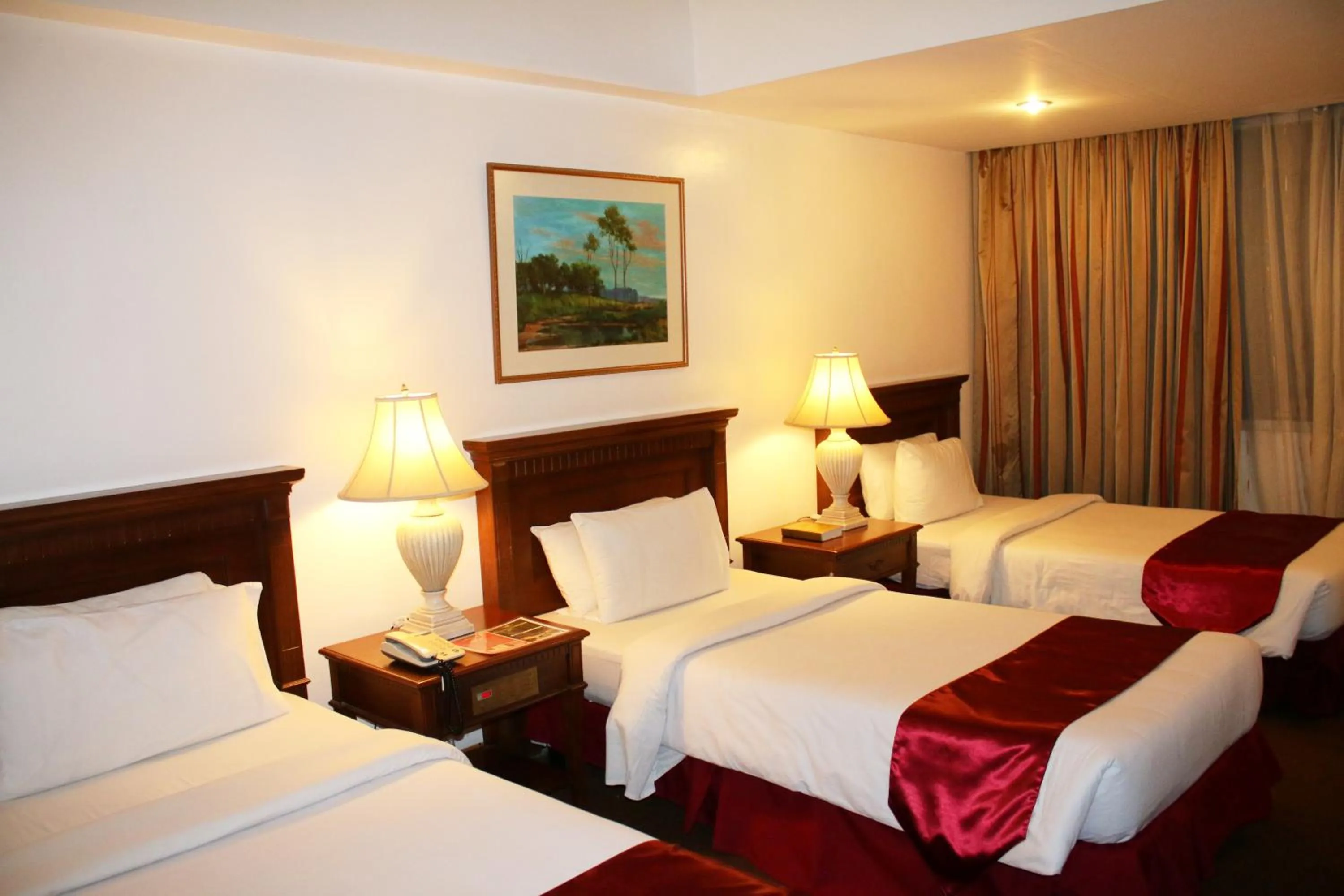 Bed in Tiara Oriental Hotel Makati powered by Cocotel