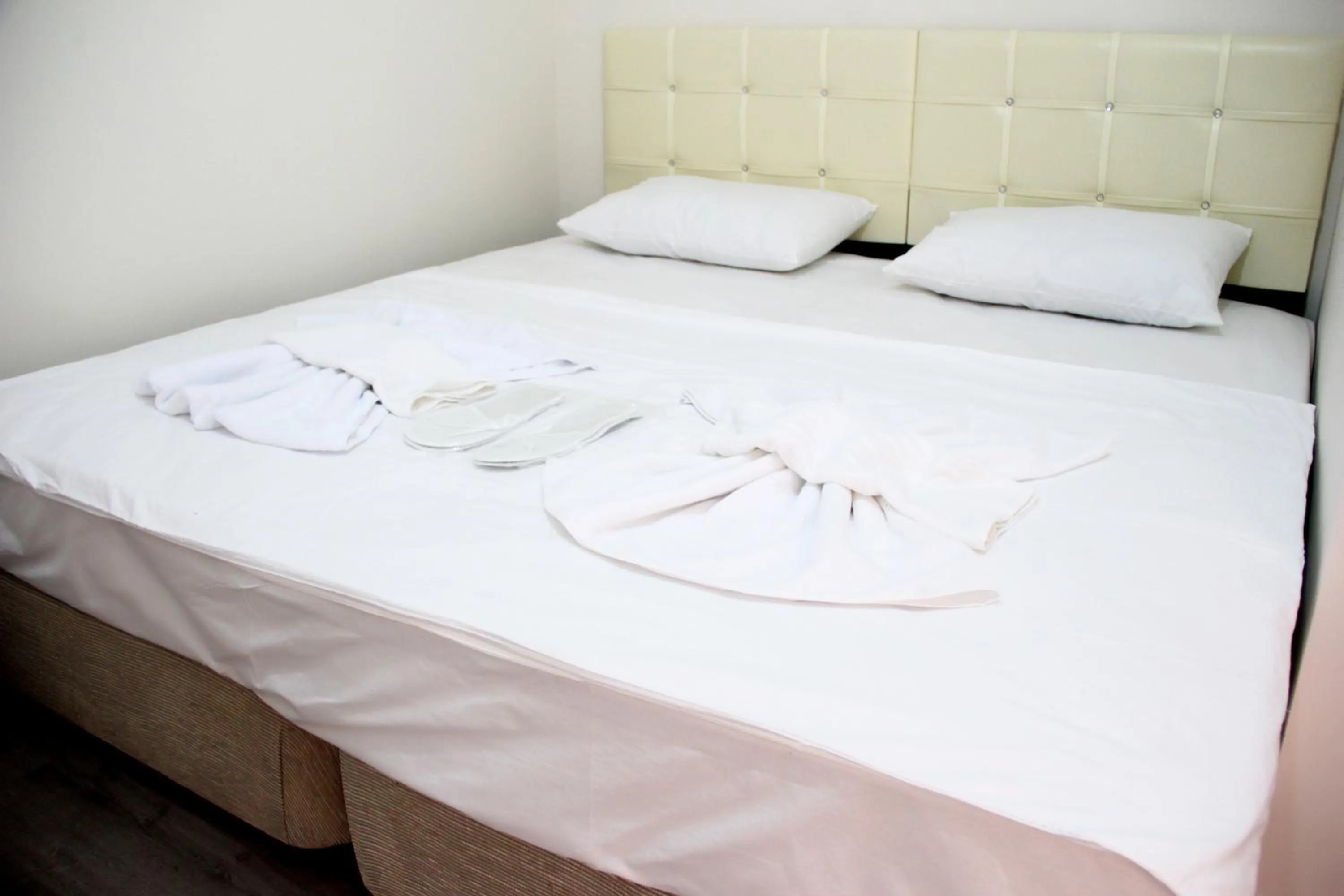 Bed in Marpalace Hotel