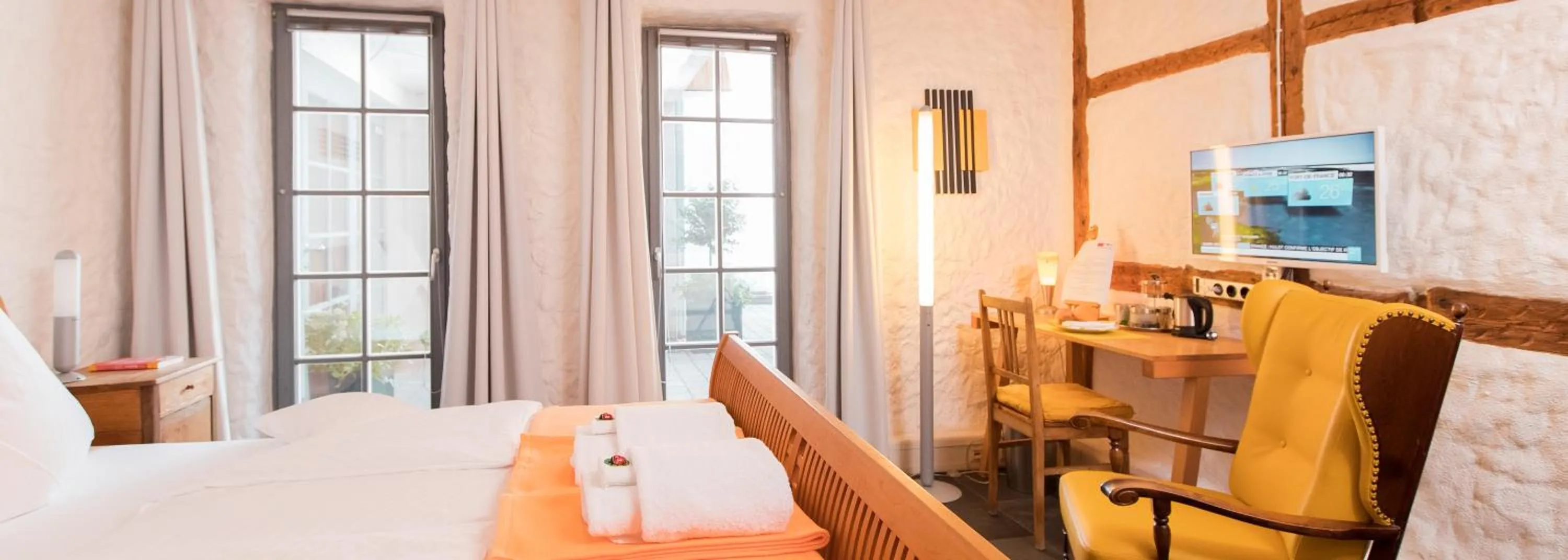 Photo of the whole room, Bed in Biohotel Kunstquartier