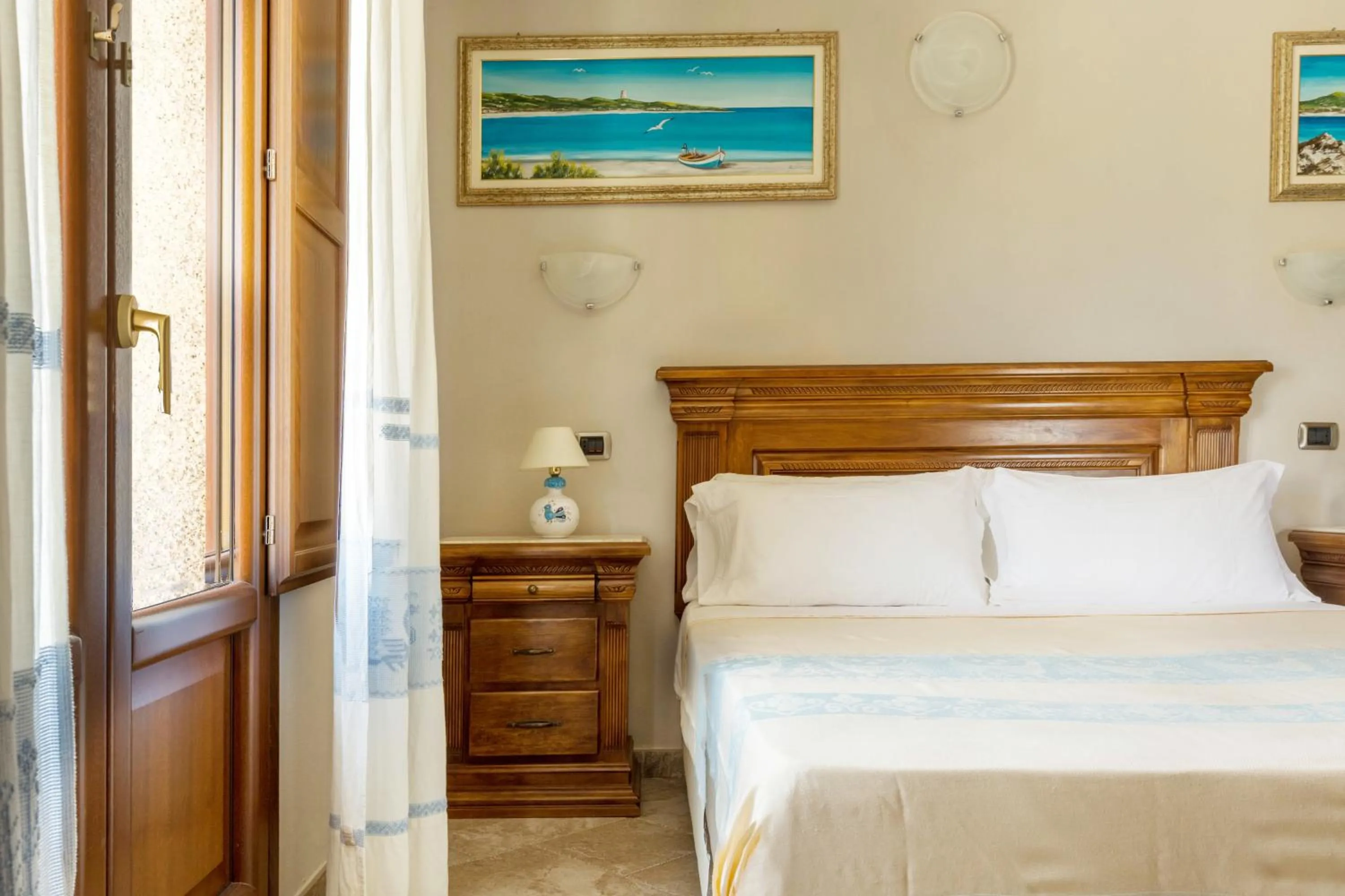 Bed in Hotel Sa Suergia