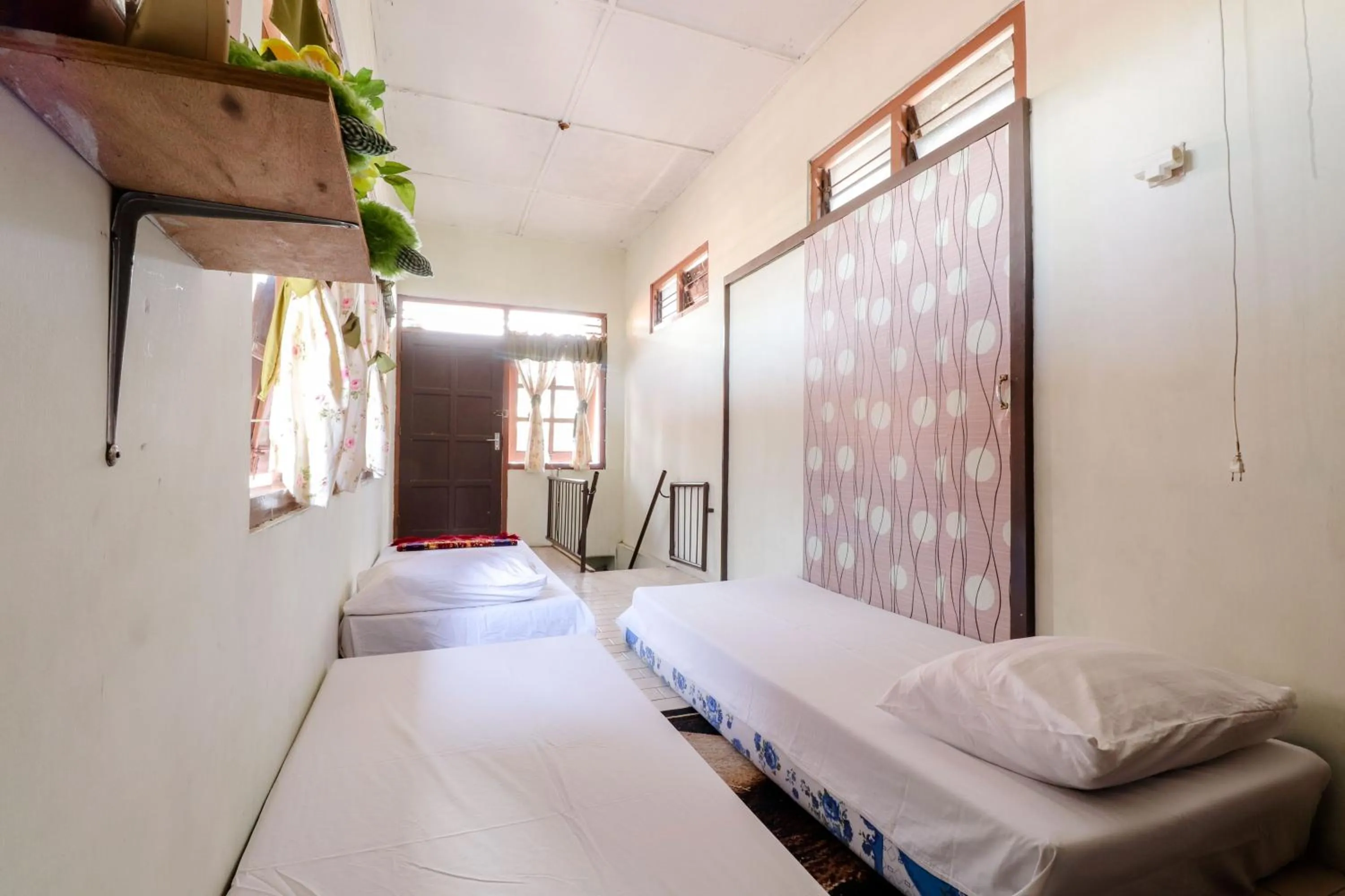 Bed in Adil Jaya Homestay