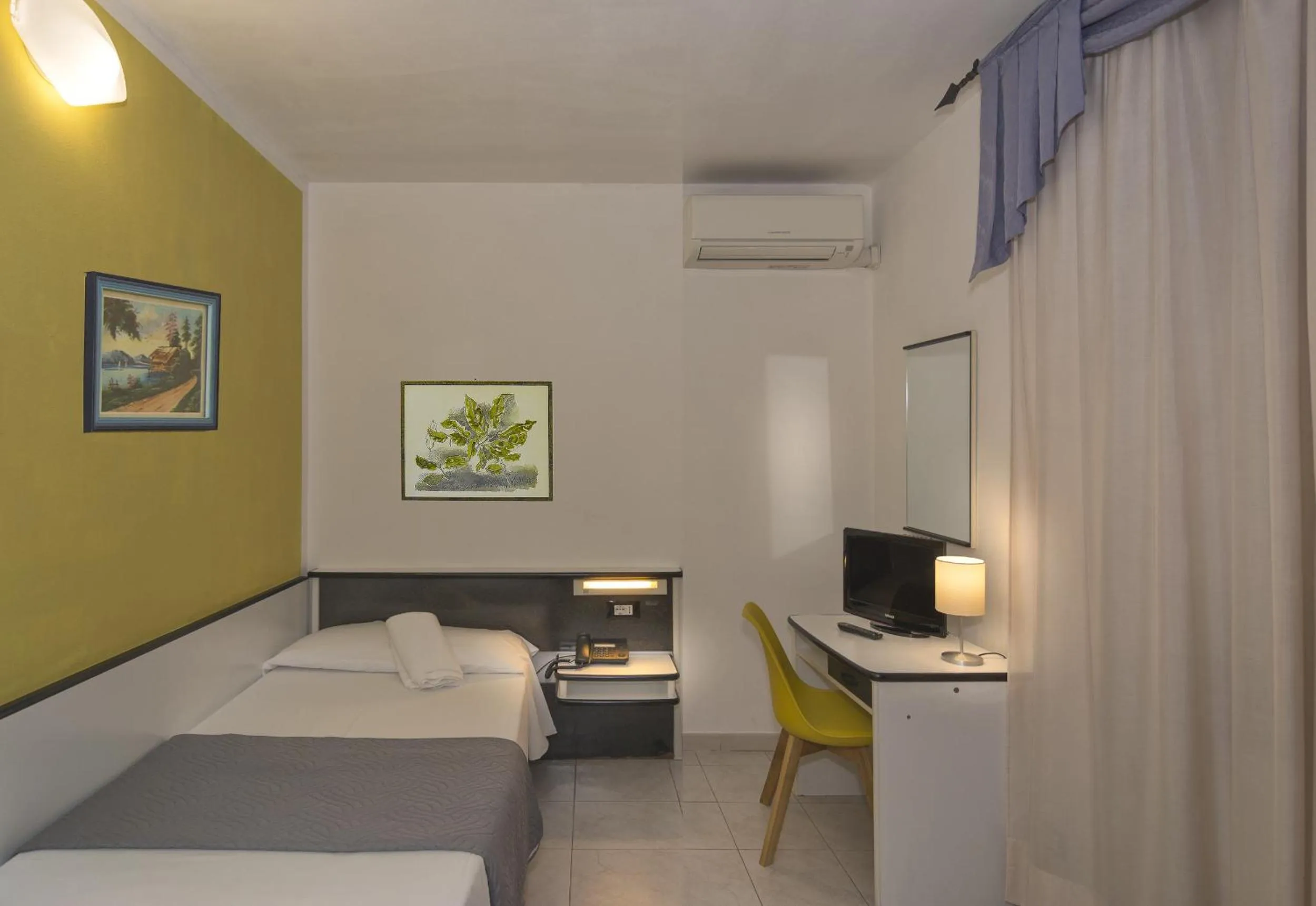 Bed in Hotel Amalfitana