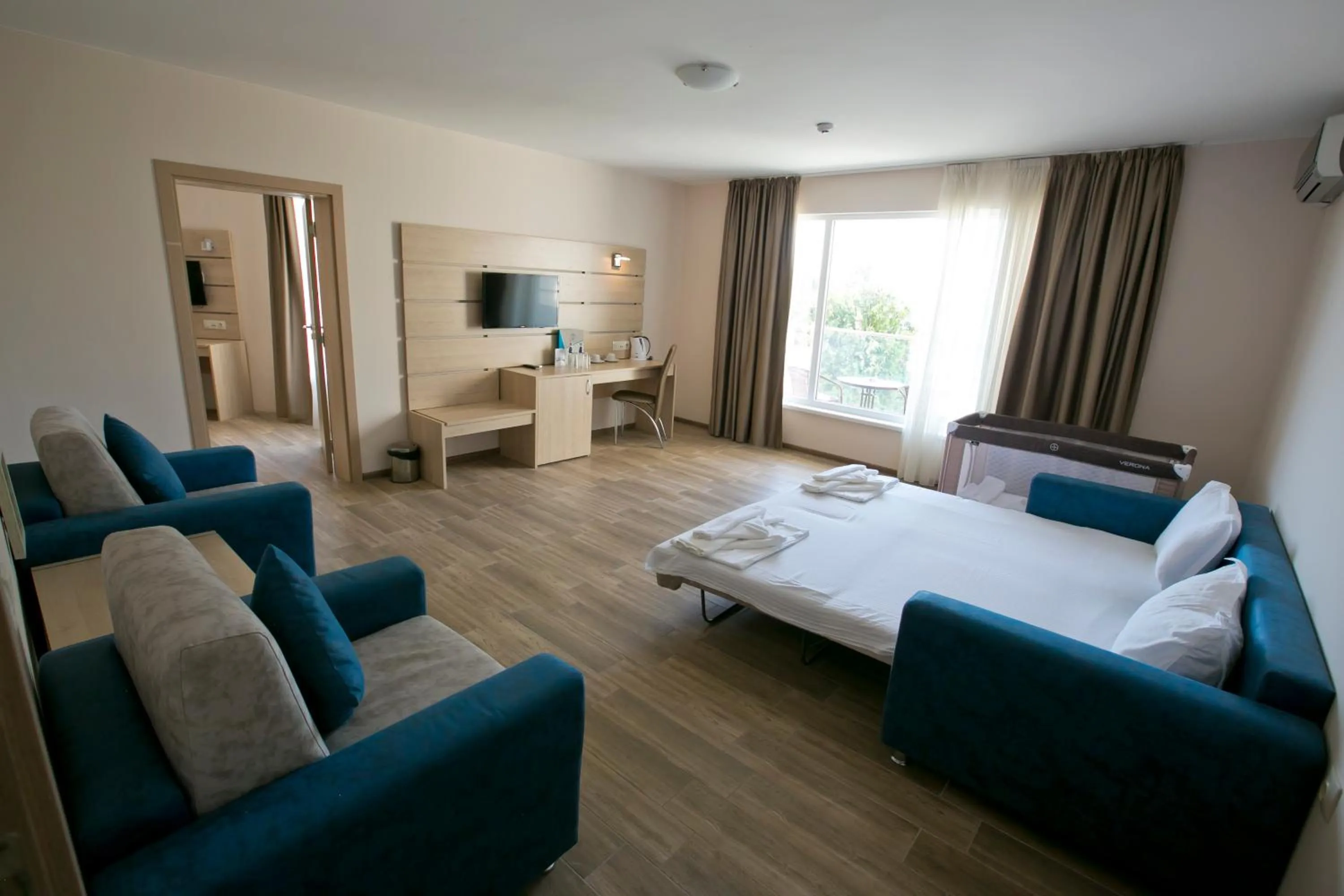 Living room, Bed in Royal Bay Resort & Aqua Park - All Inclusive and Free beach accsess