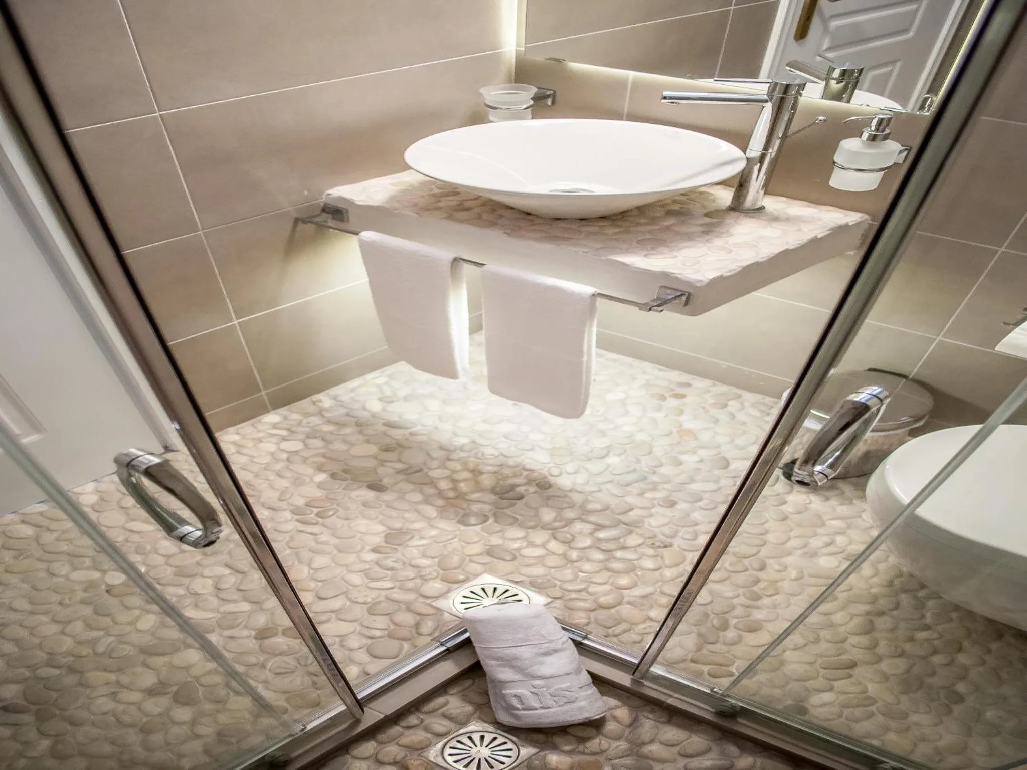 Bathroom in Milos Bay Suites