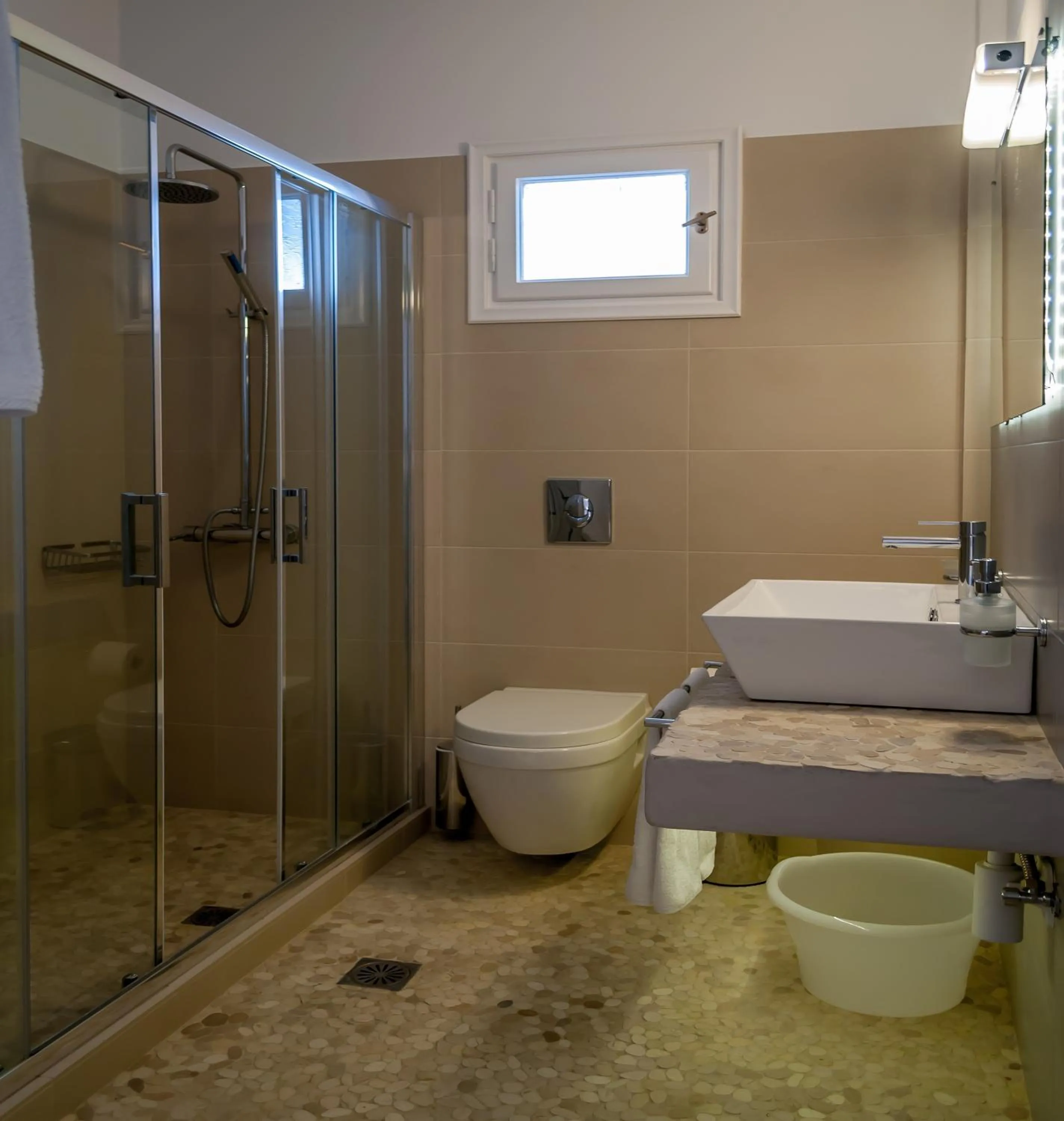 Bathroom in Milos Bay Suites