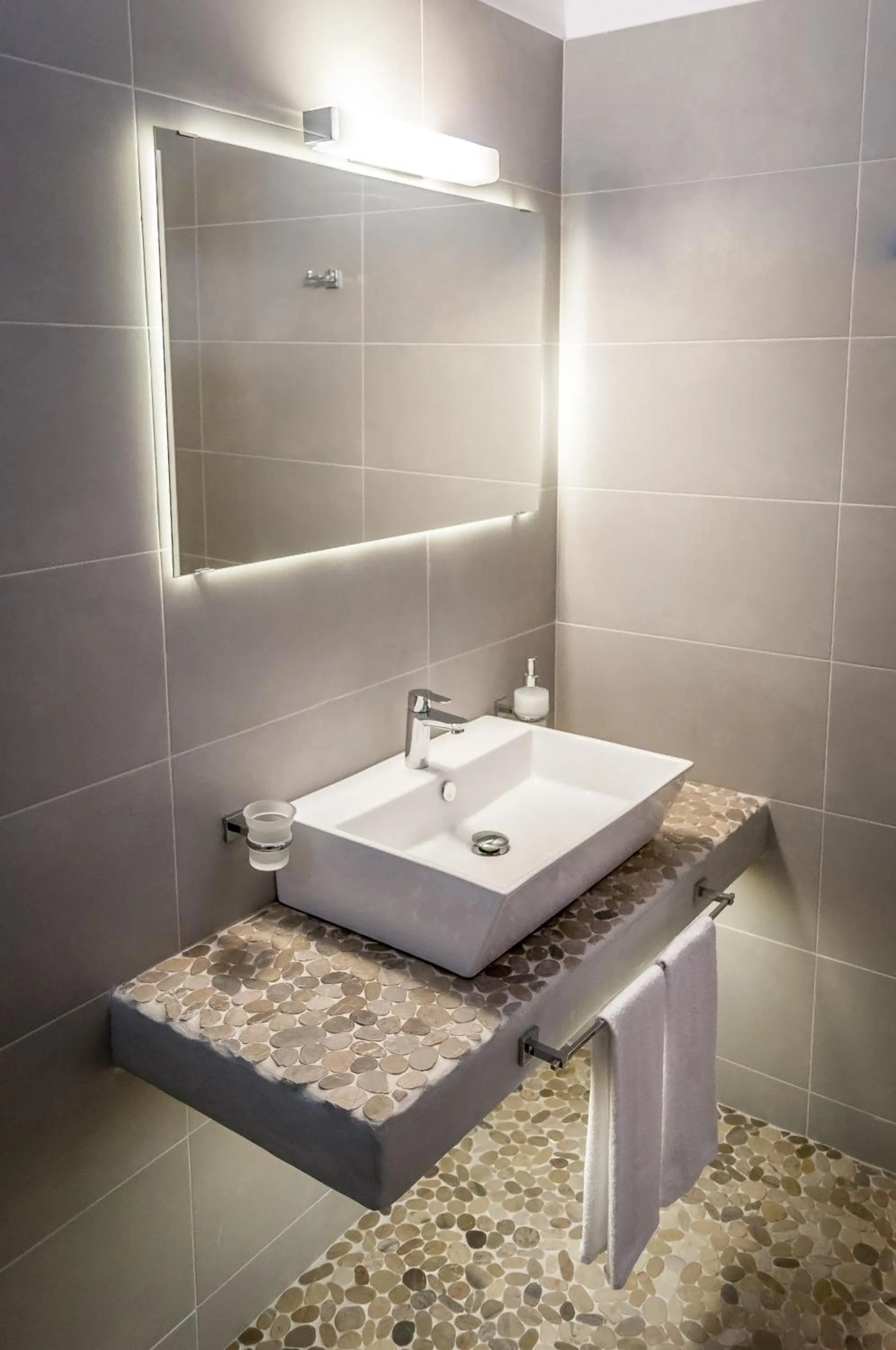 Bathroom in Milos Bay Suites