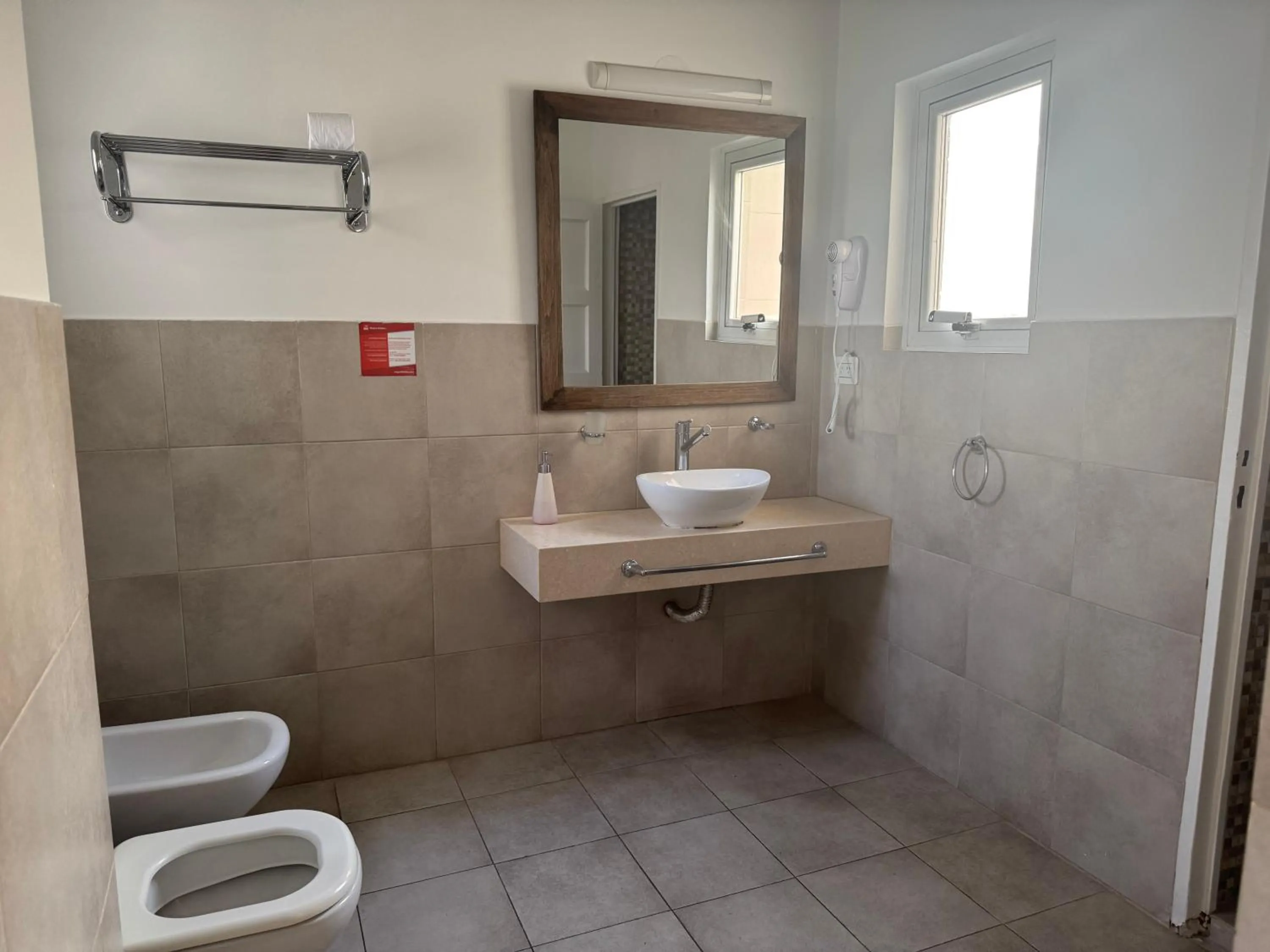 Bathroom in Hotel Lyon by MH