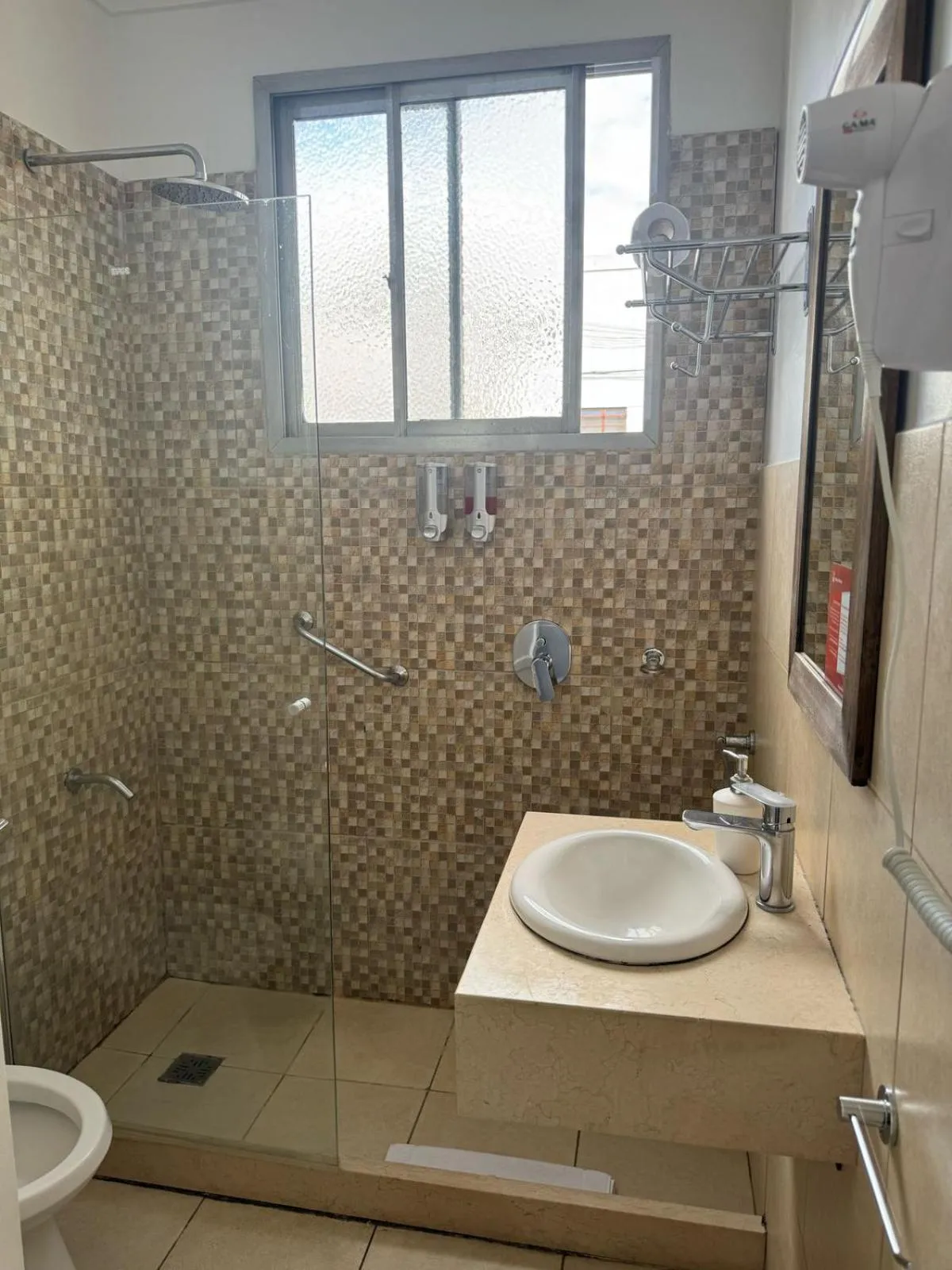 Bathroom in Hotel Lyon by MH