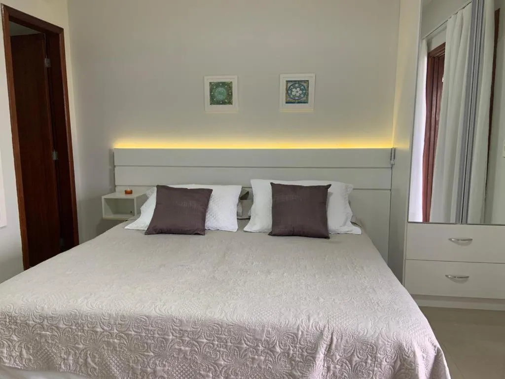 Bed in Pousada Mar de Cristal