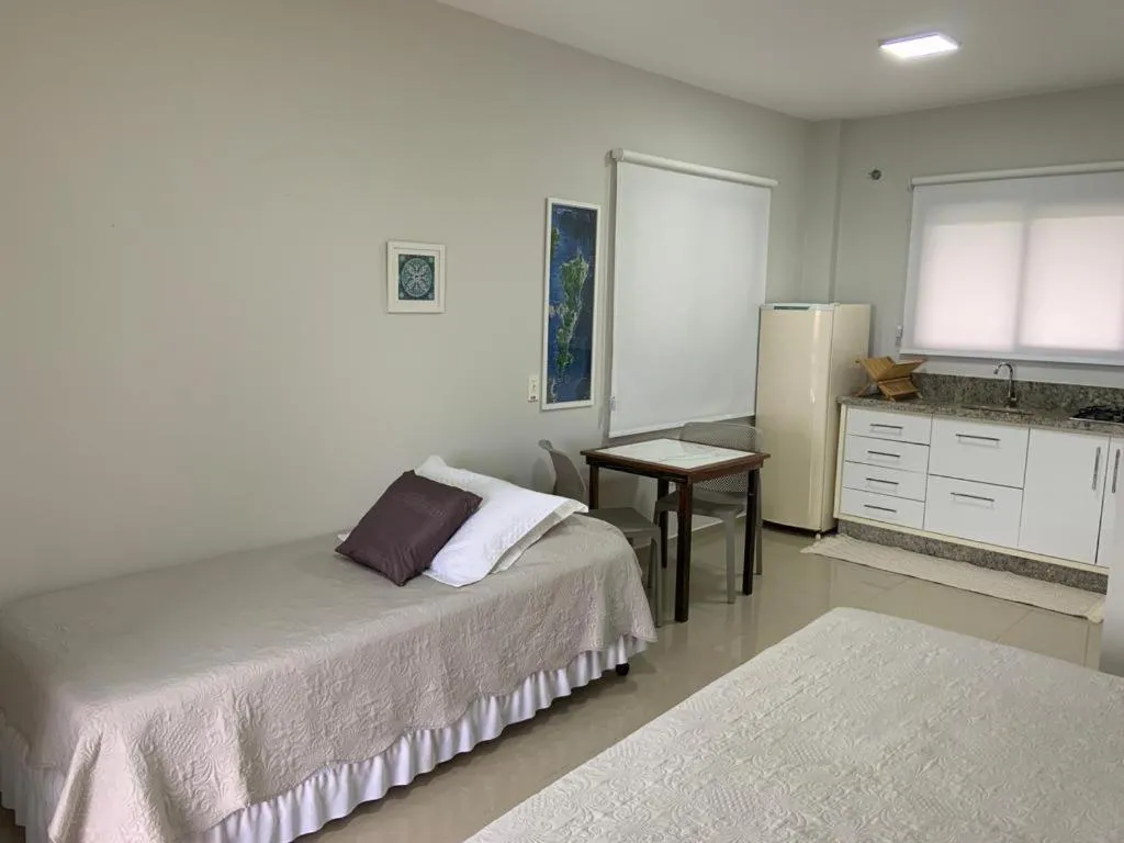 Bed in Pousada Mar de Cristal