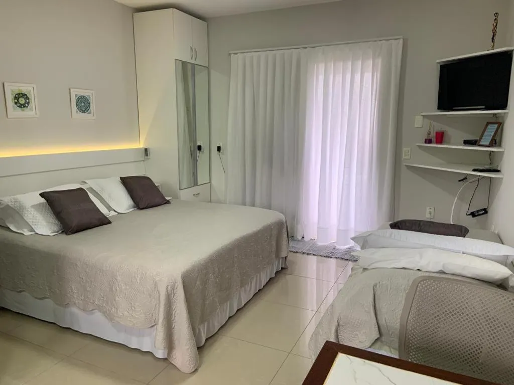 Bed in Pousada Mar de Cristal