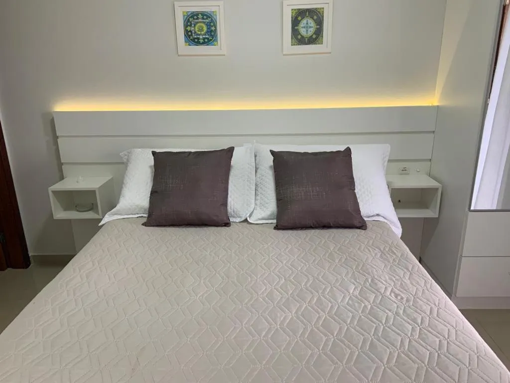 Bed in Pousada Mar de Cristal