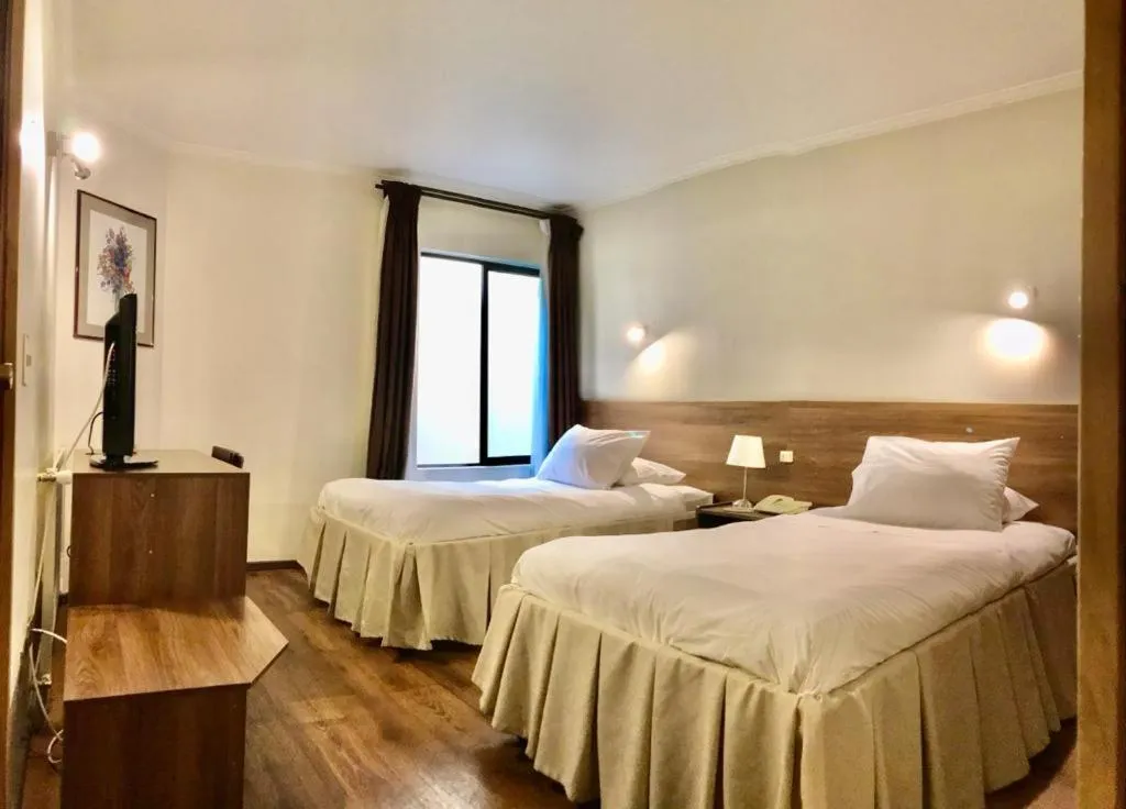 Bed in KU Hotel Turismo Temuco