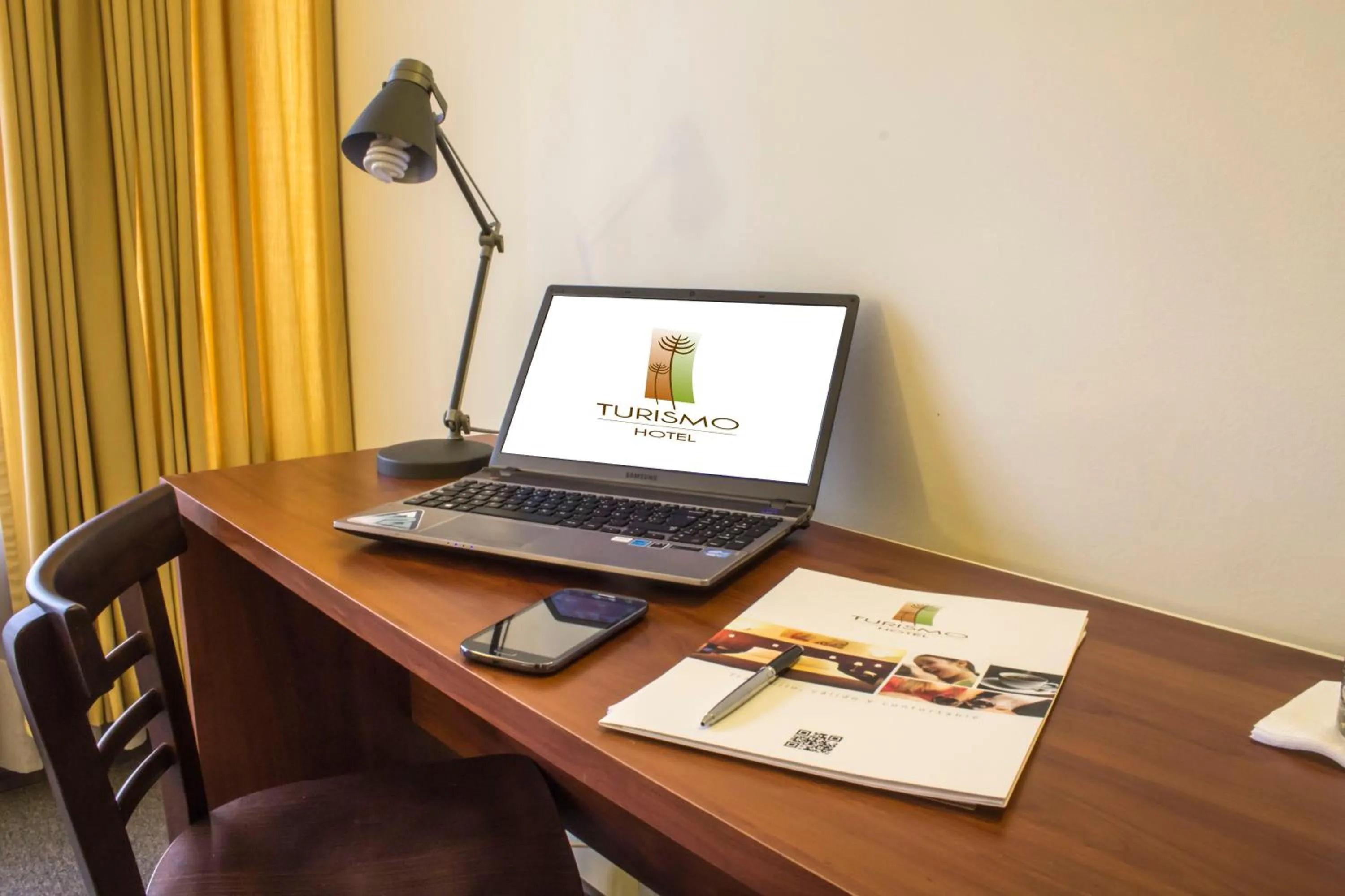 TV and multimedia in KU Hotel Turismo Temuco