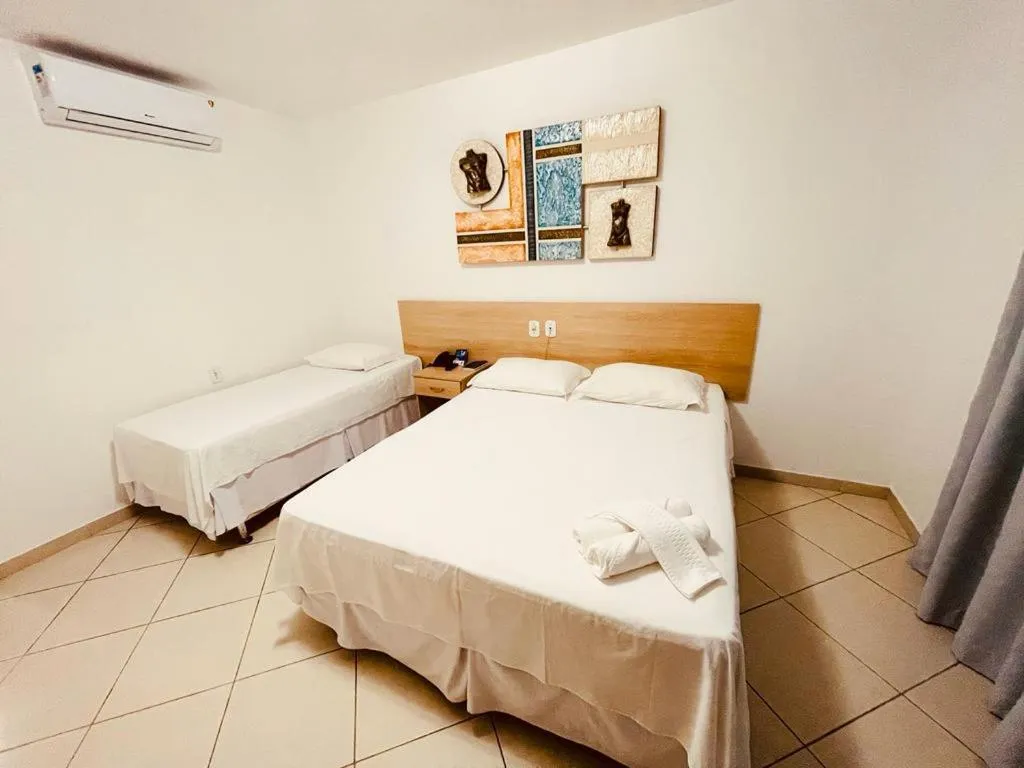 Bed in Pioneiro Hotel