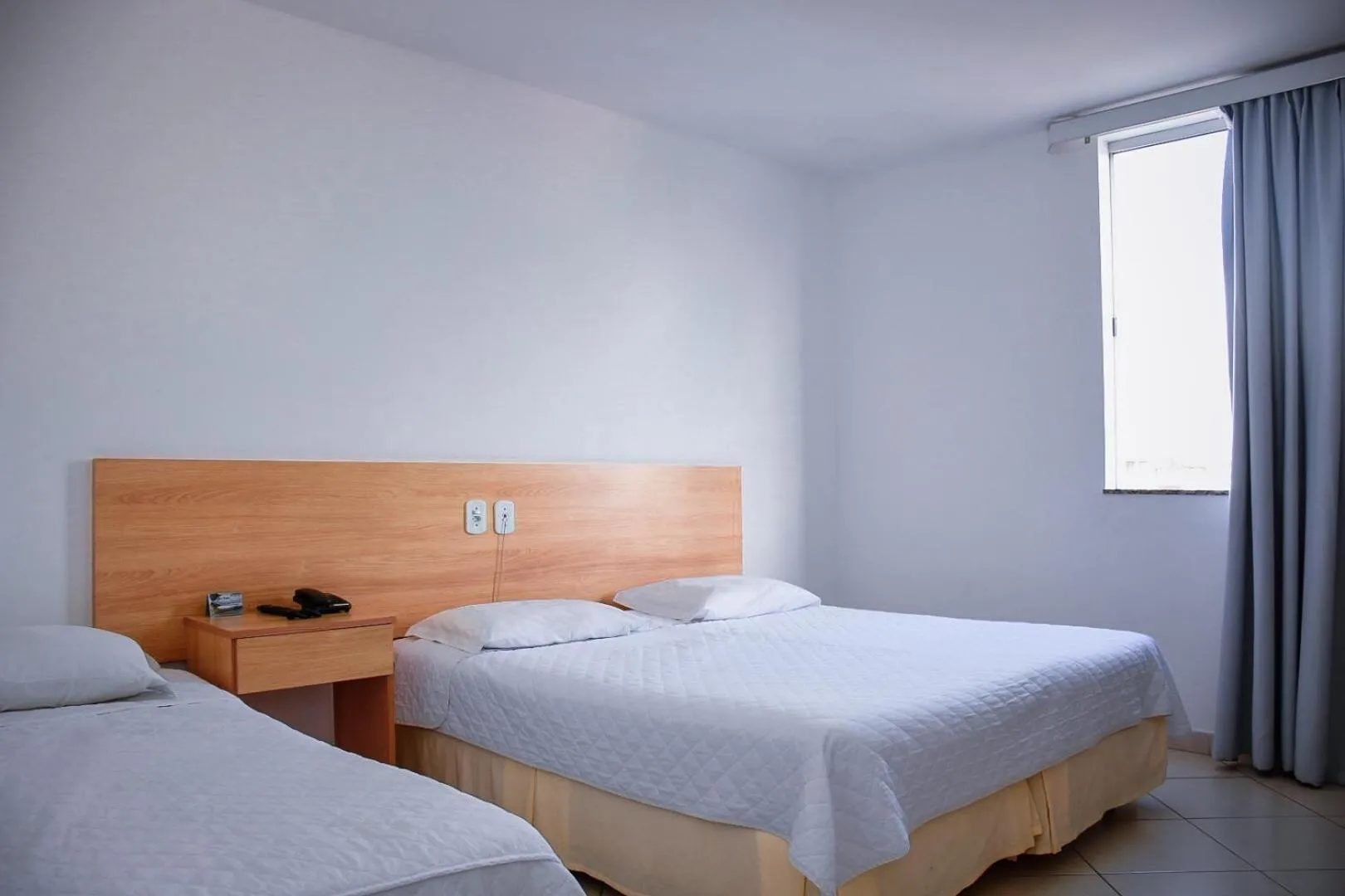 Bed in Pioneiro Hotel