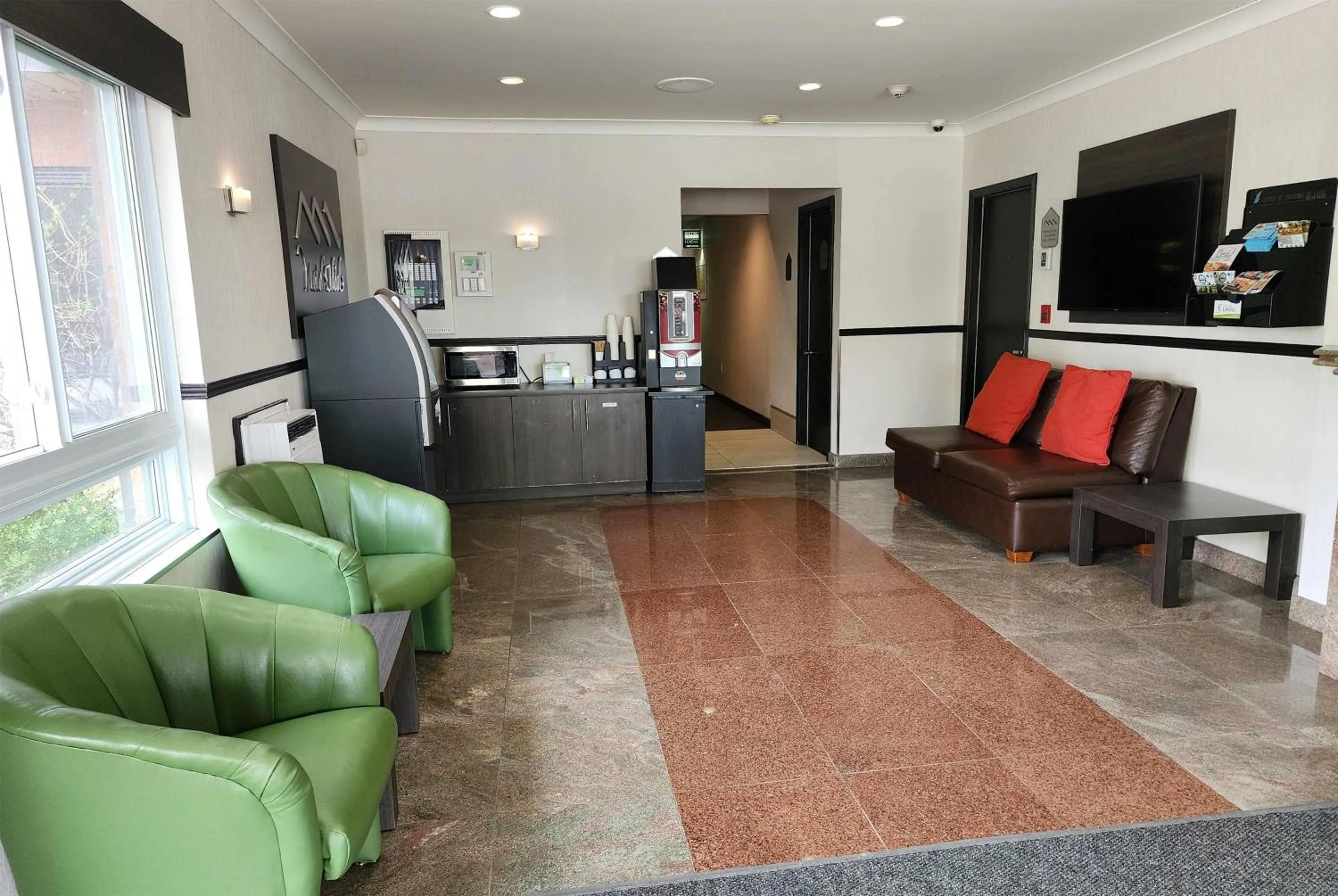 Lobby or reception in Ramada by Wyndham Laval