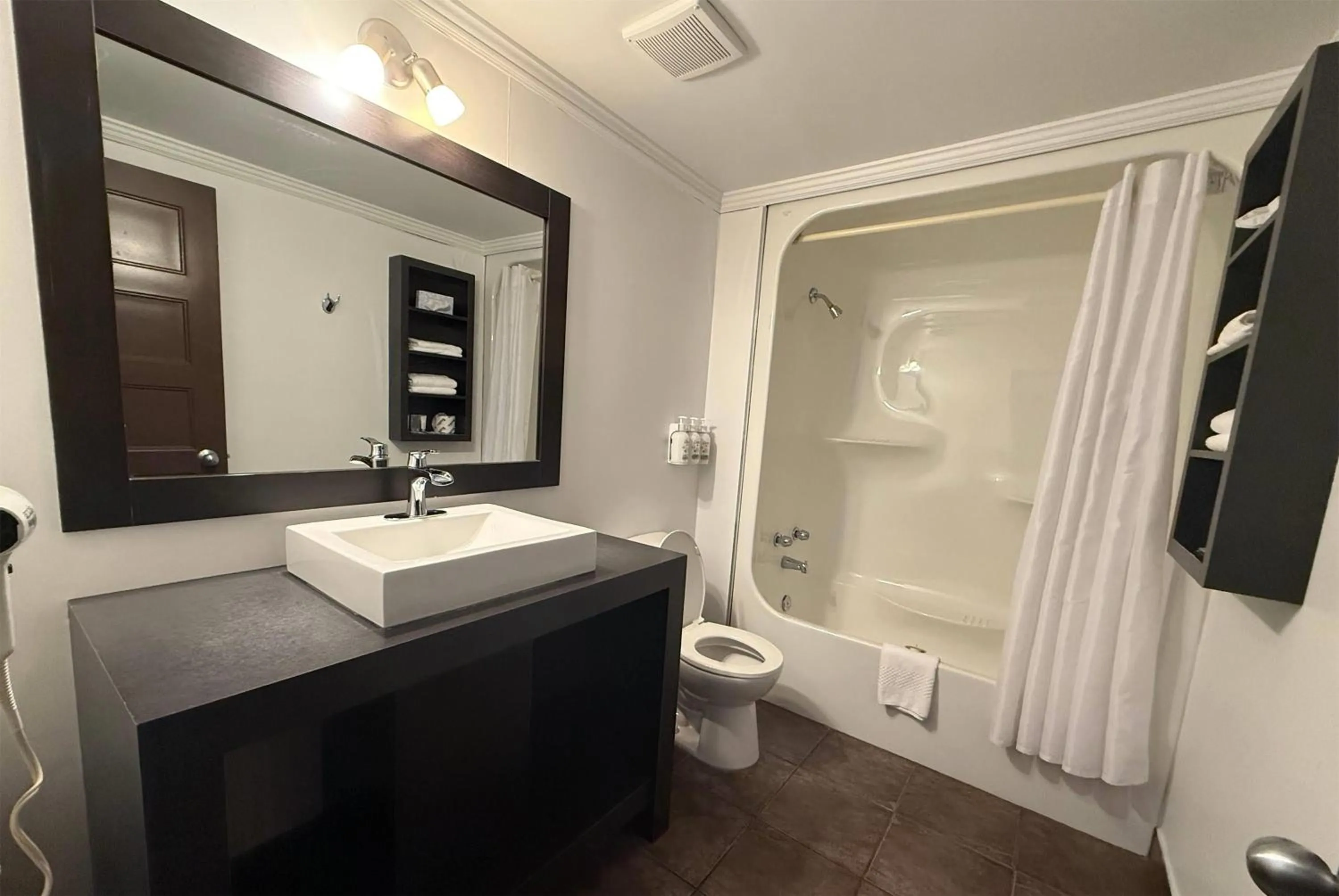 Bathroom in Ramada by Wyndham Laval