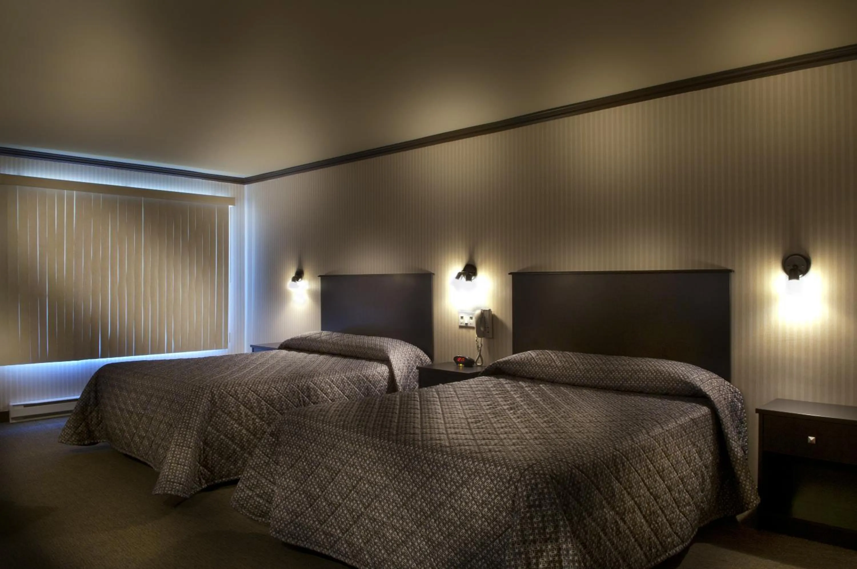 Bed in Ramada by Wyndham Laval