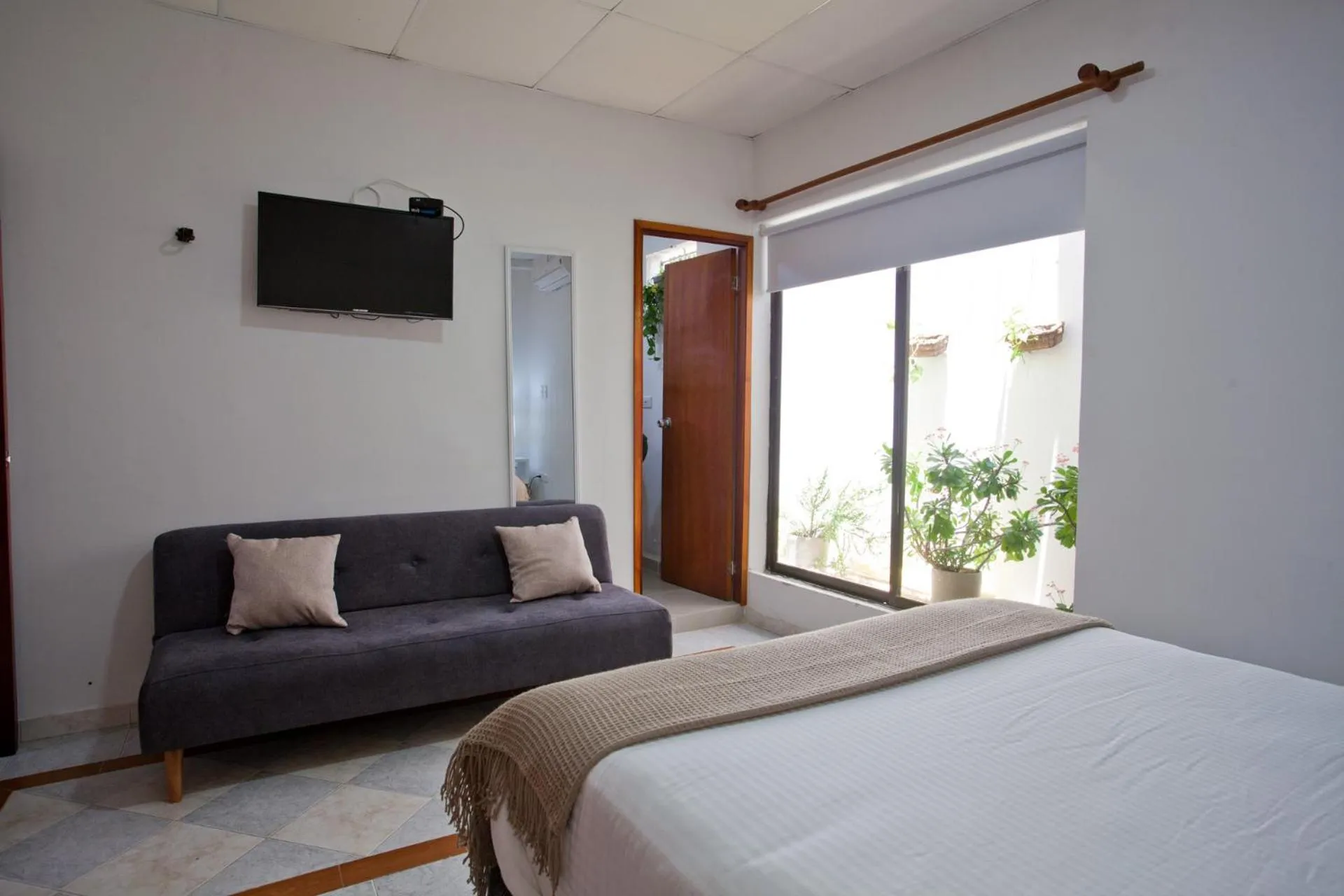 TV and multimedia, Bed in Mucura Hotel & Spa