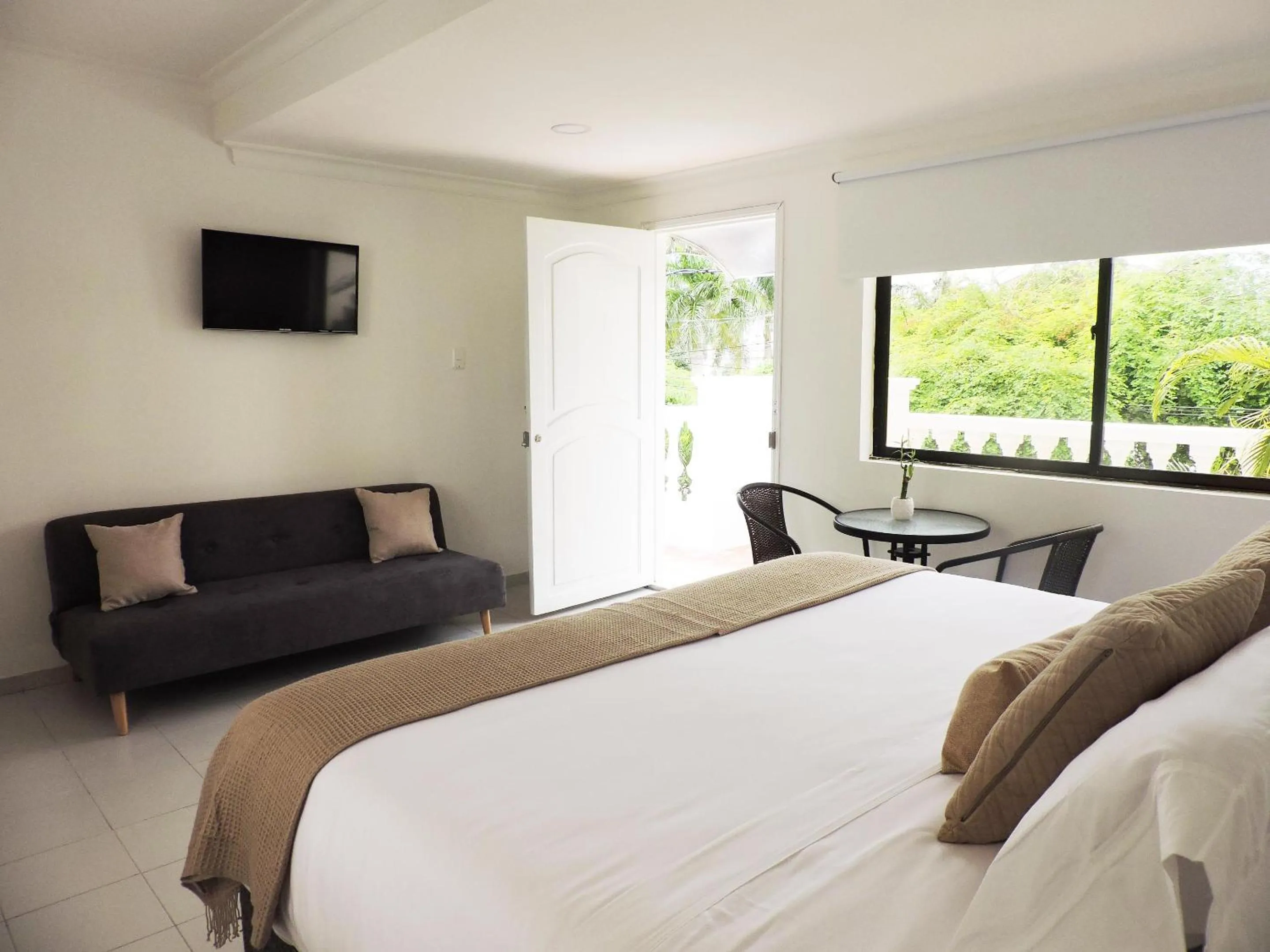 Photo of the whole room, Bed in Mucura Hotel & Spa