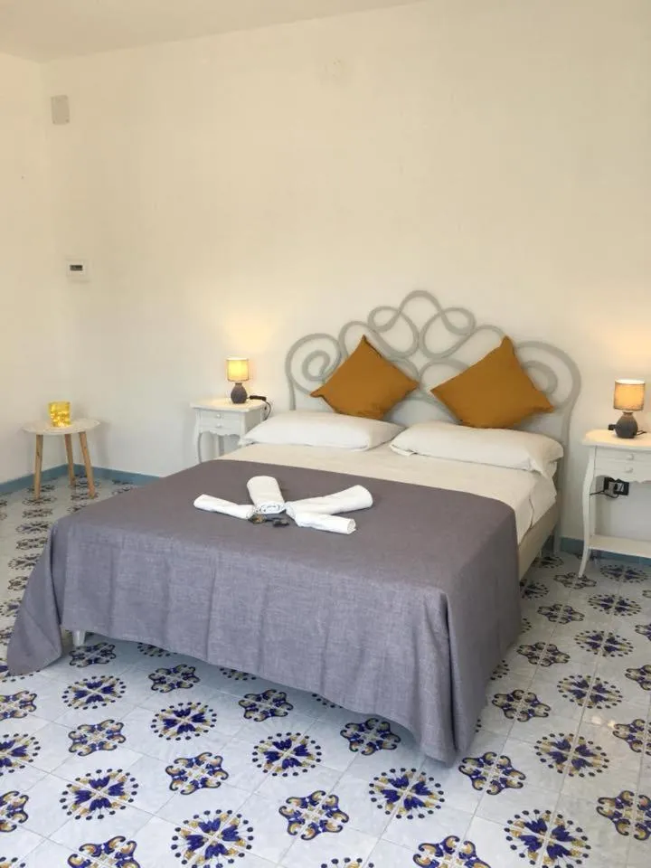 Bed in B&B Mediterraneo