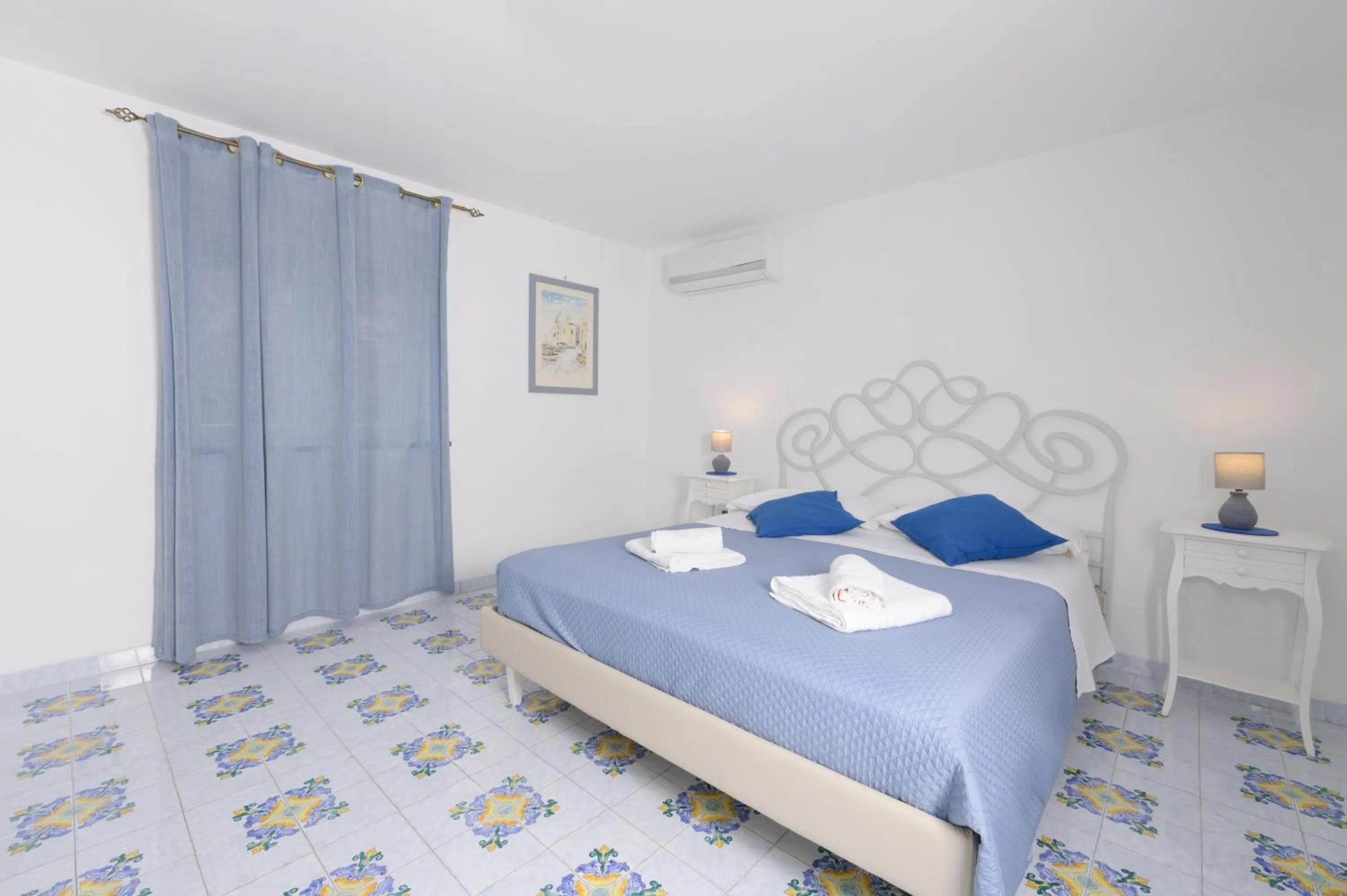 Bed in B&B Mediterraneo
