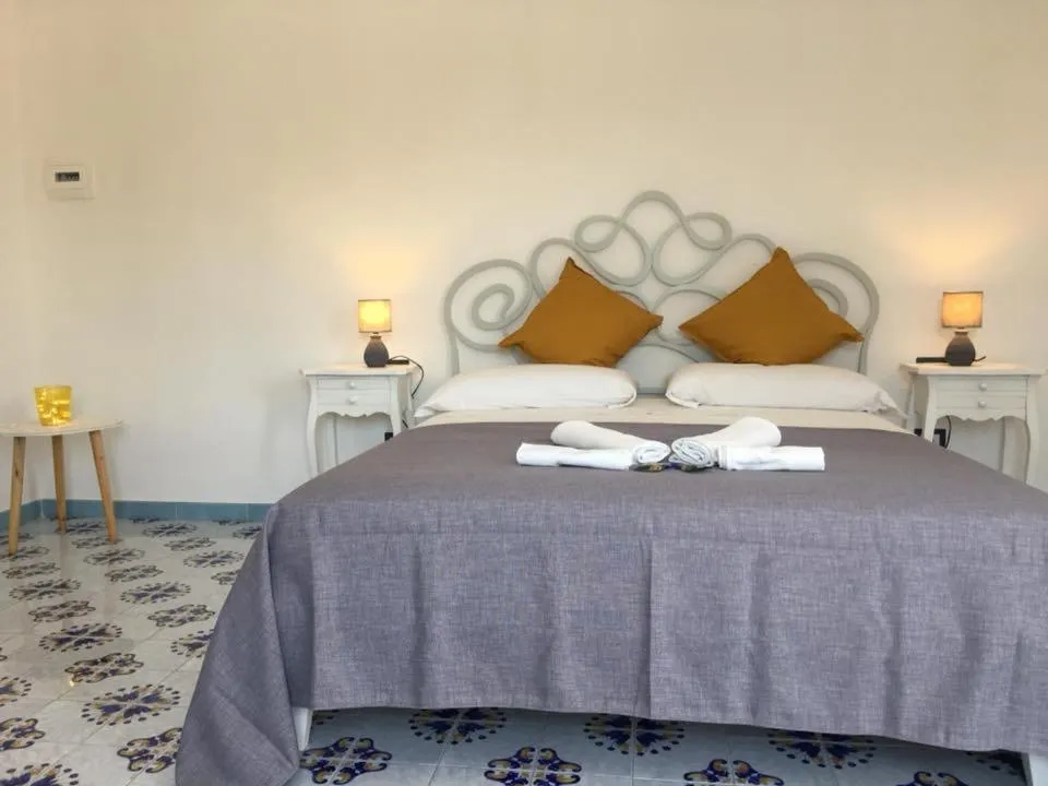 Bed in B&B Mediterraneo