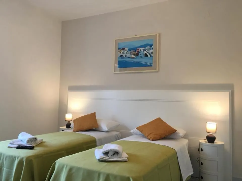 Bed in B&B Mediterraneo