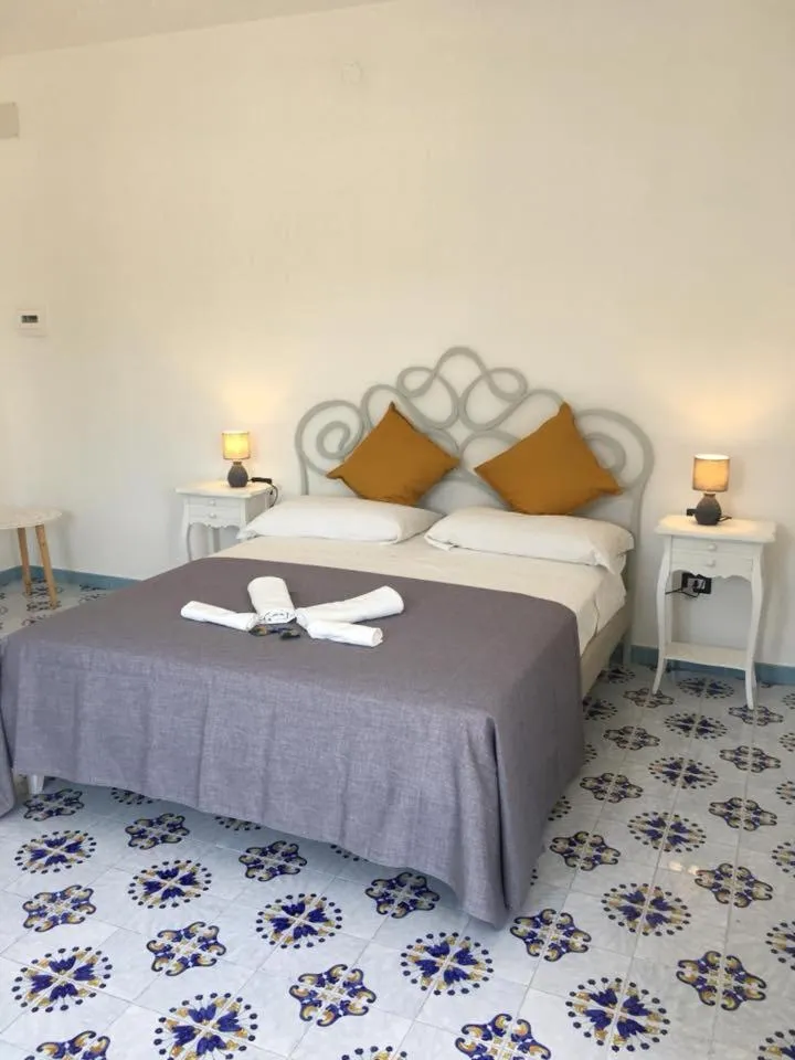 Bed in B&B Mediterraneo