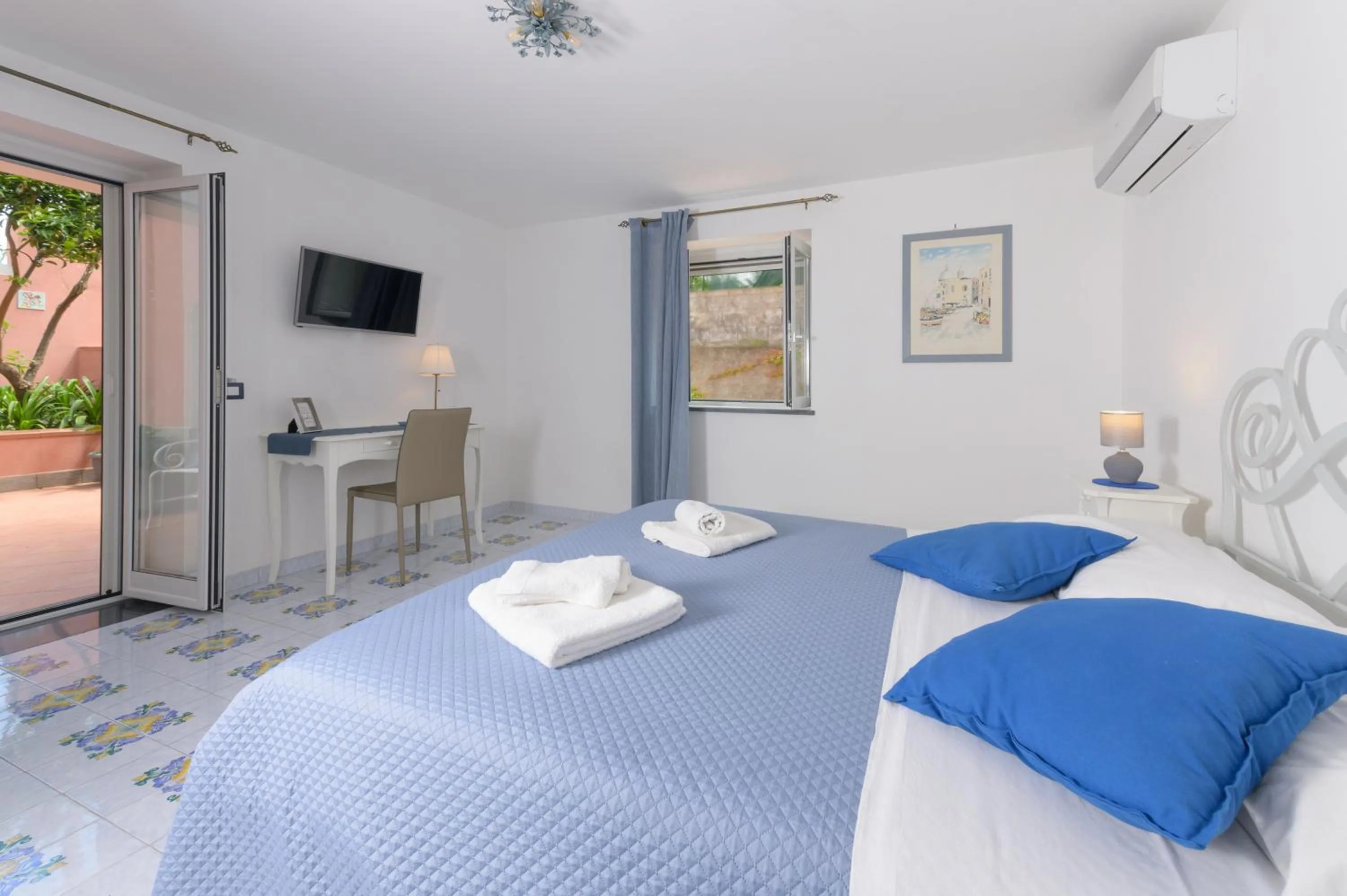Bed in B&B Mediterraneo