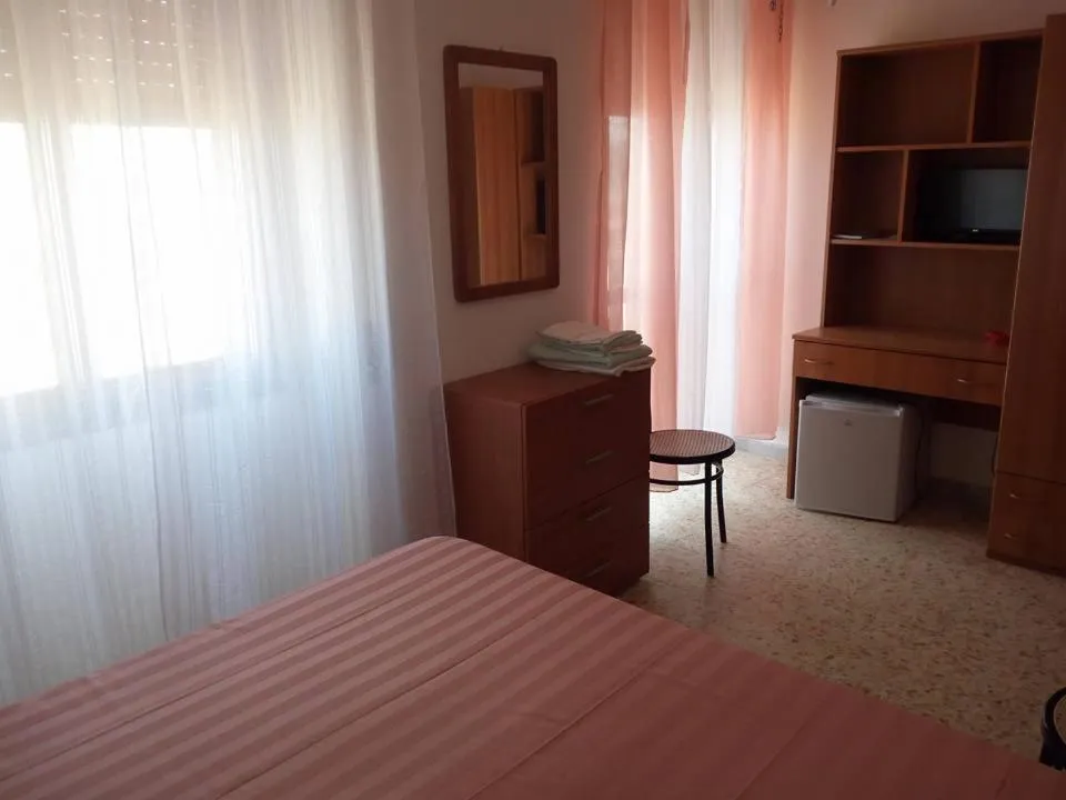 Bed in La Scogliera Bed & Breakfast