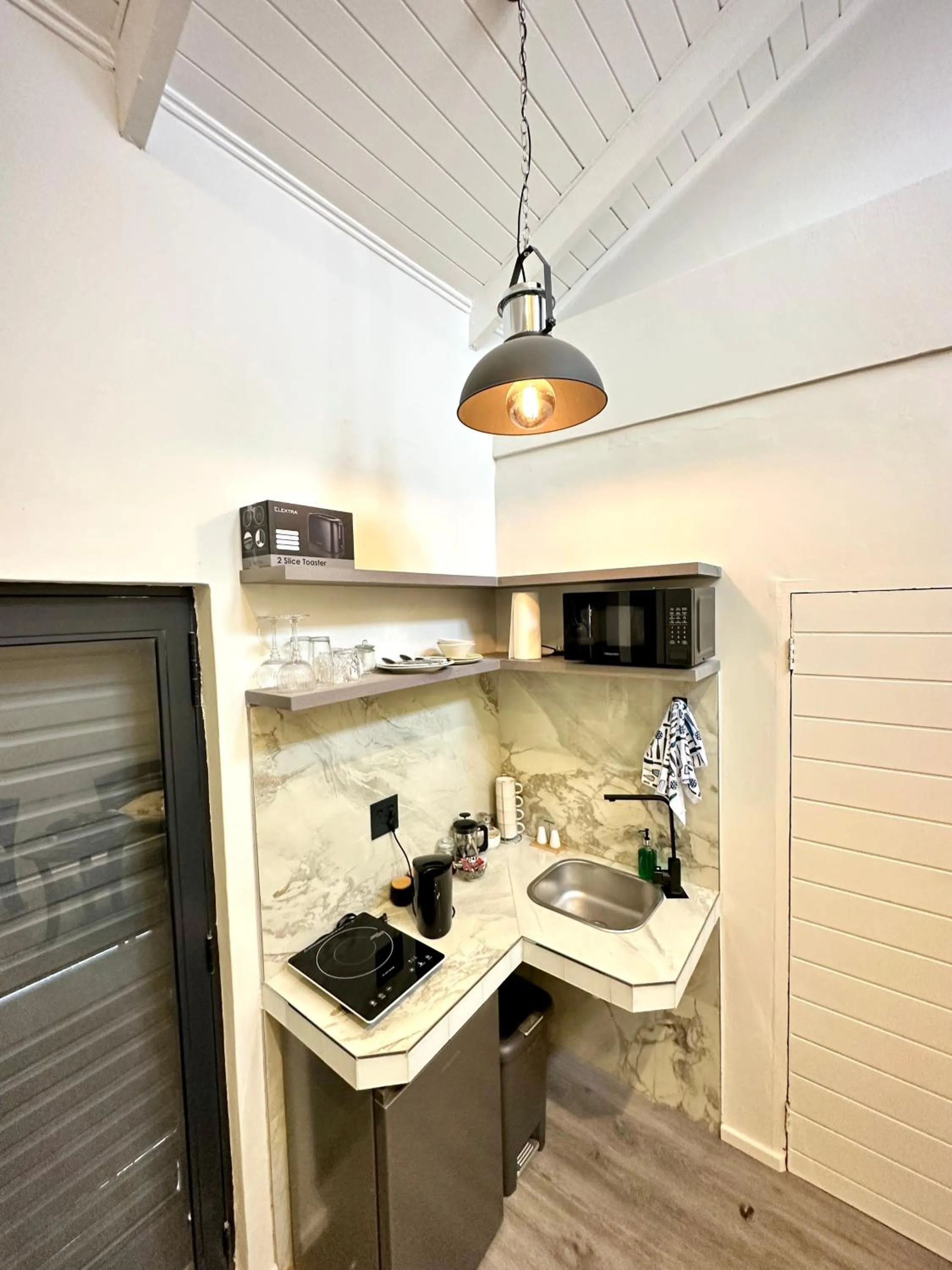 Kitchen or kitchenette in Spacube Luxury Suites and Spa