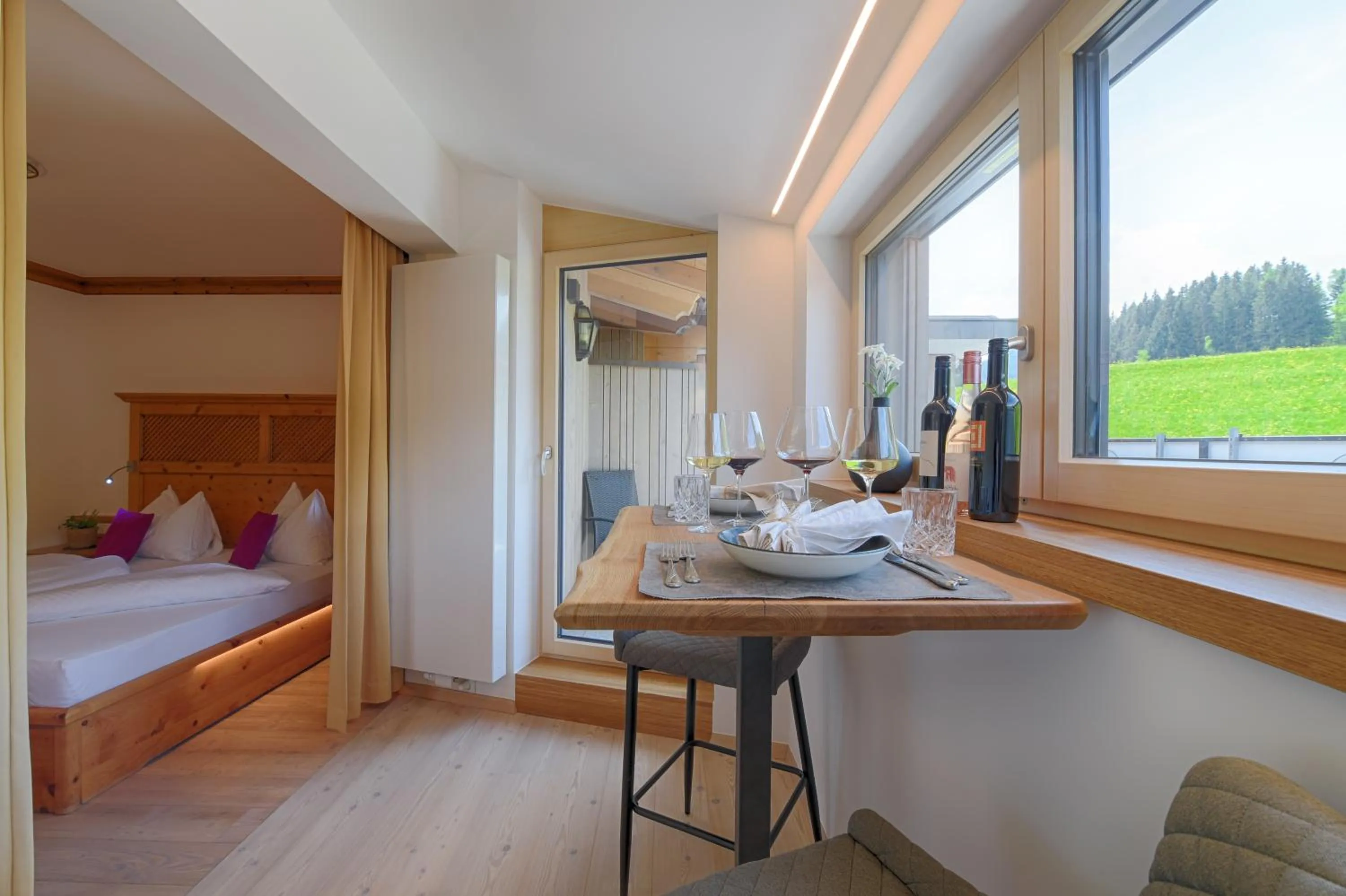 Bed in Hotel und Alpen Apartments mit Sauna - Bürglhöh