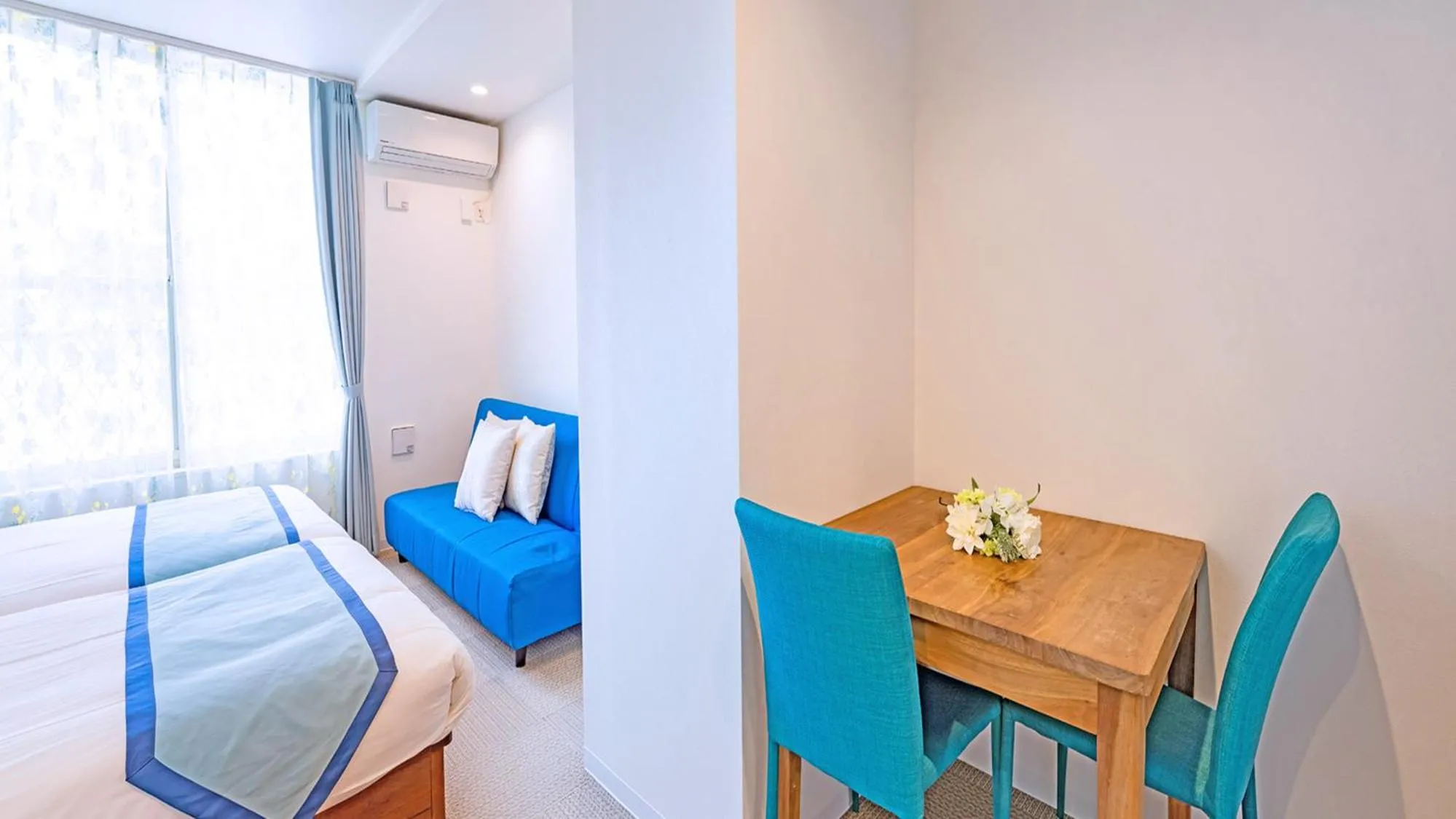 Bed in Palm Springs Miyakojima Resort