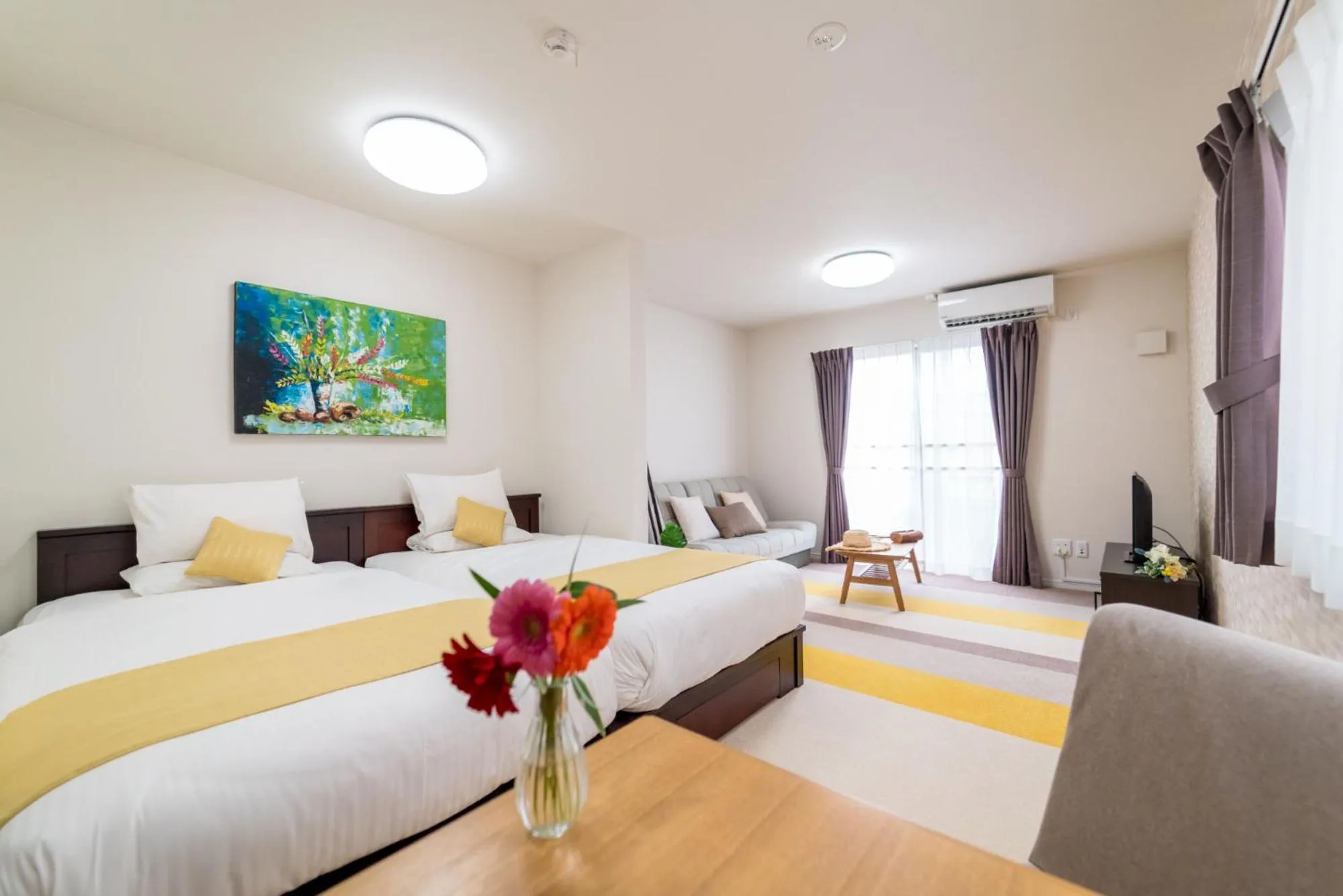 Bed in Palm Springs Miyakojima Resort