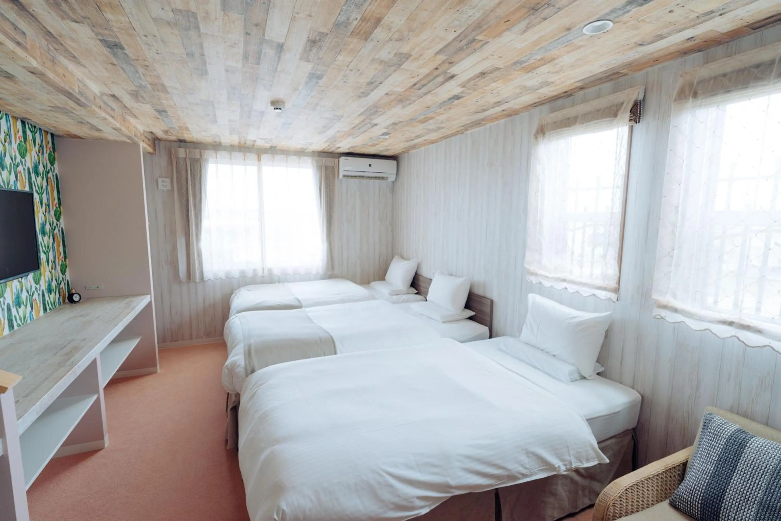 Bed in Palm Springs Miyakojima Resort