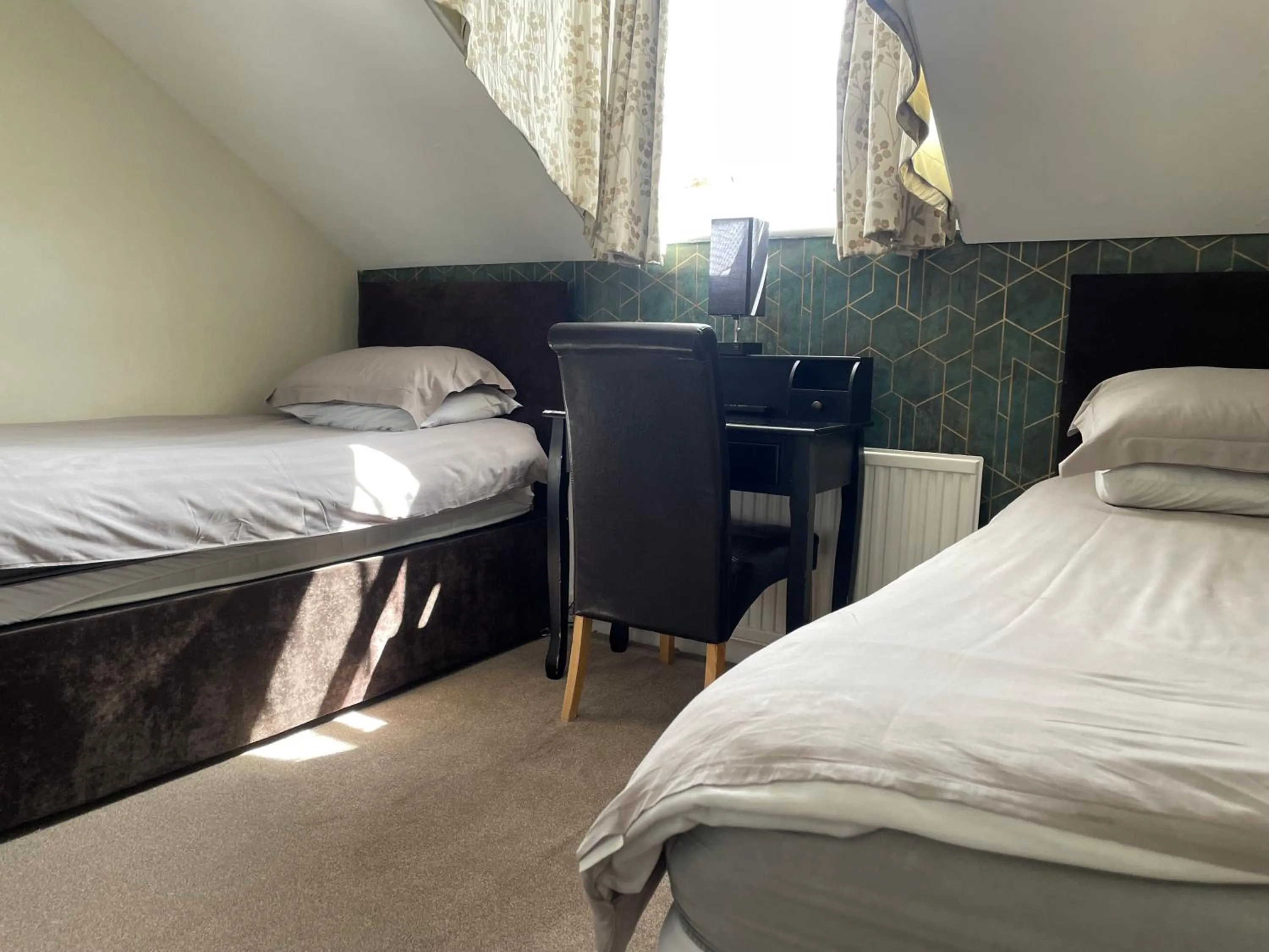 Bed in Burton Villa Guest House