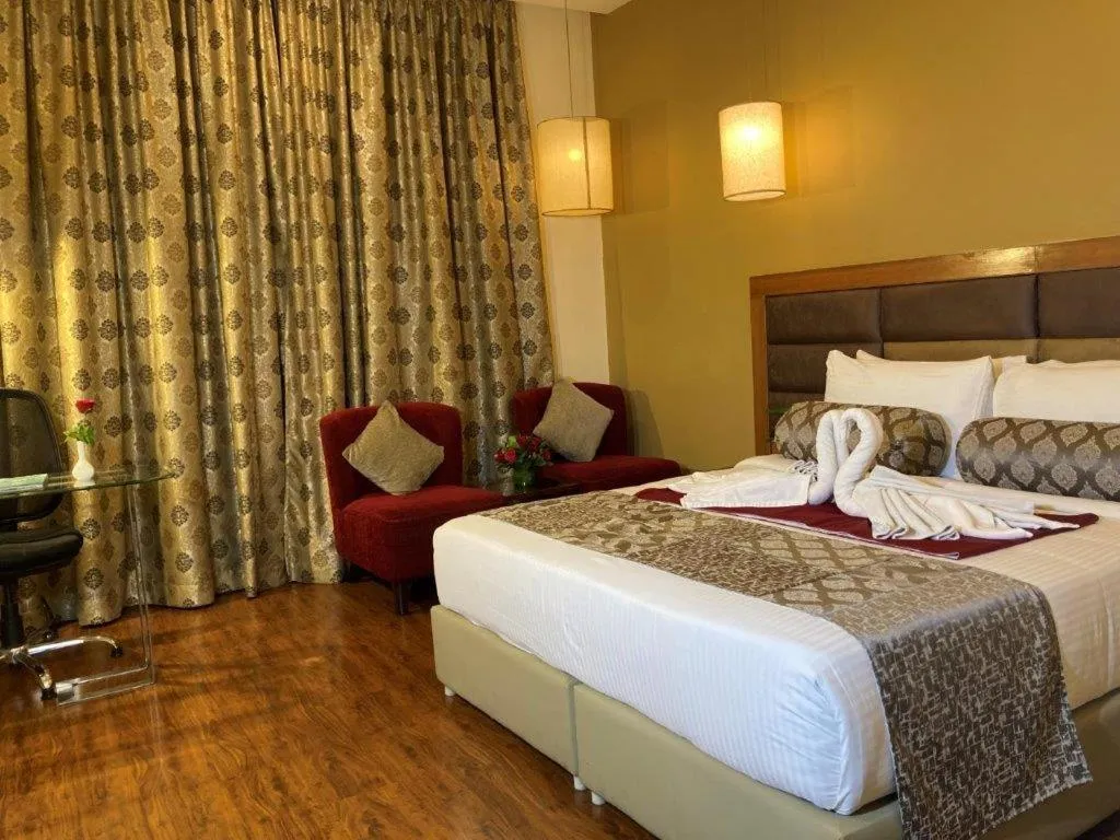 Bedroom, Bed in Hotel Ramanashree Richmond