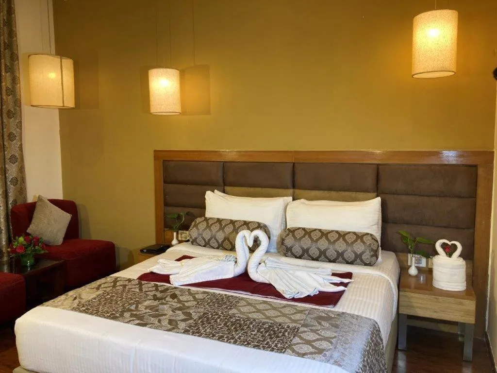 Bedroom, Bed in Hotel Ramanashree Richmond