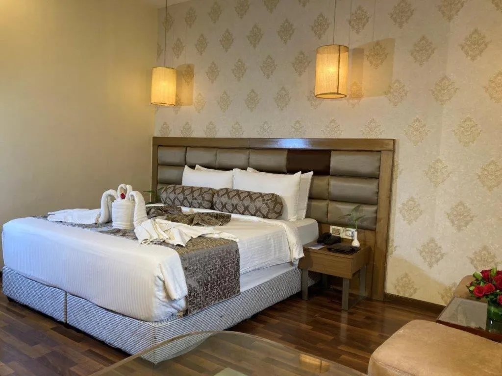 Bedroom, Bed in Hotel Ramanashree Richmond