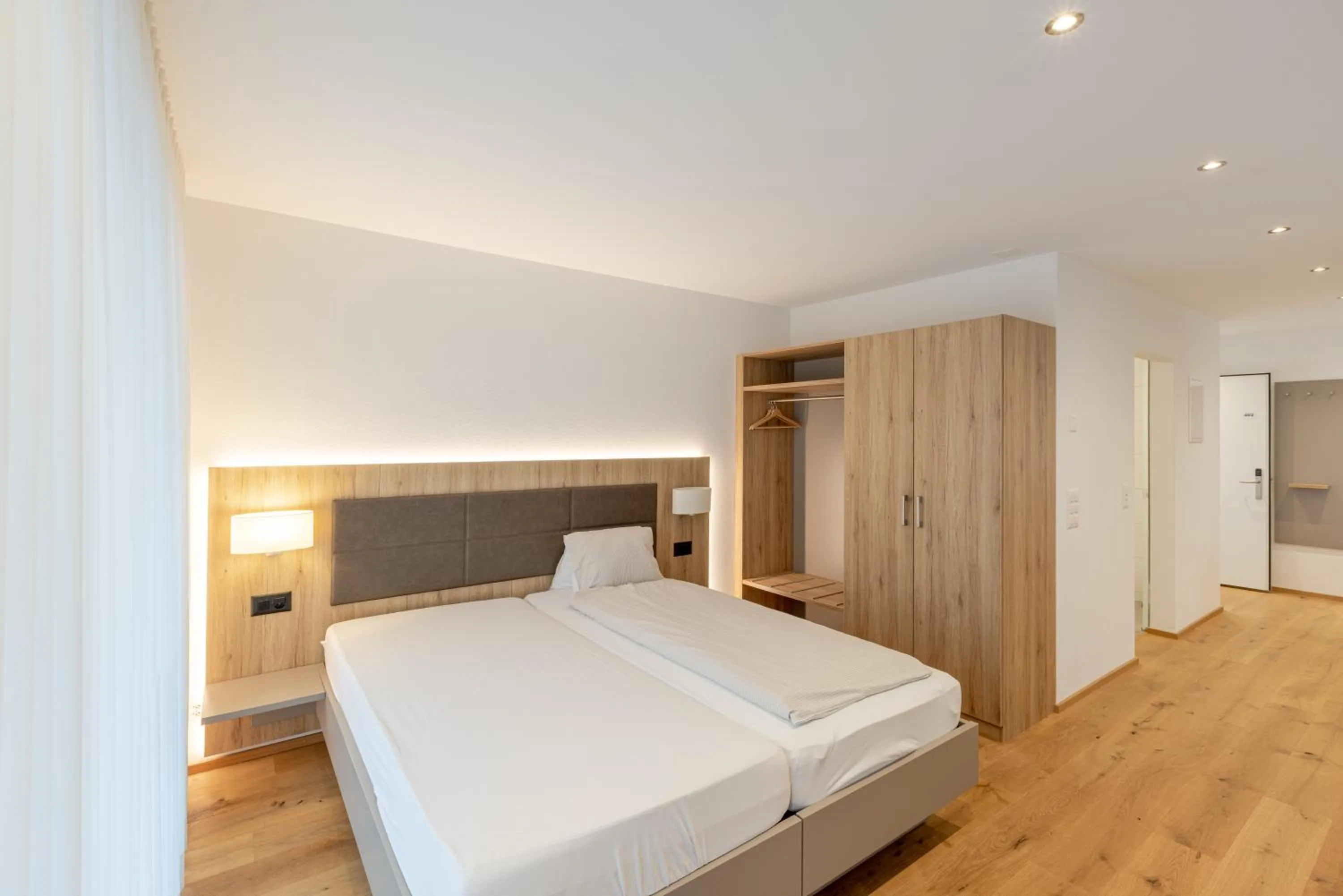 Bed in Hotel Flamatt