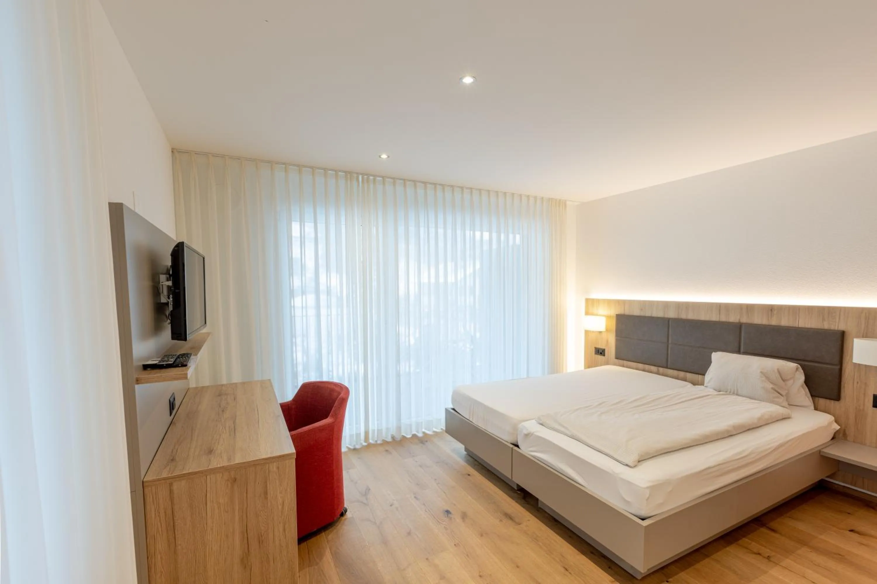 Bed in Hotel Flamatt