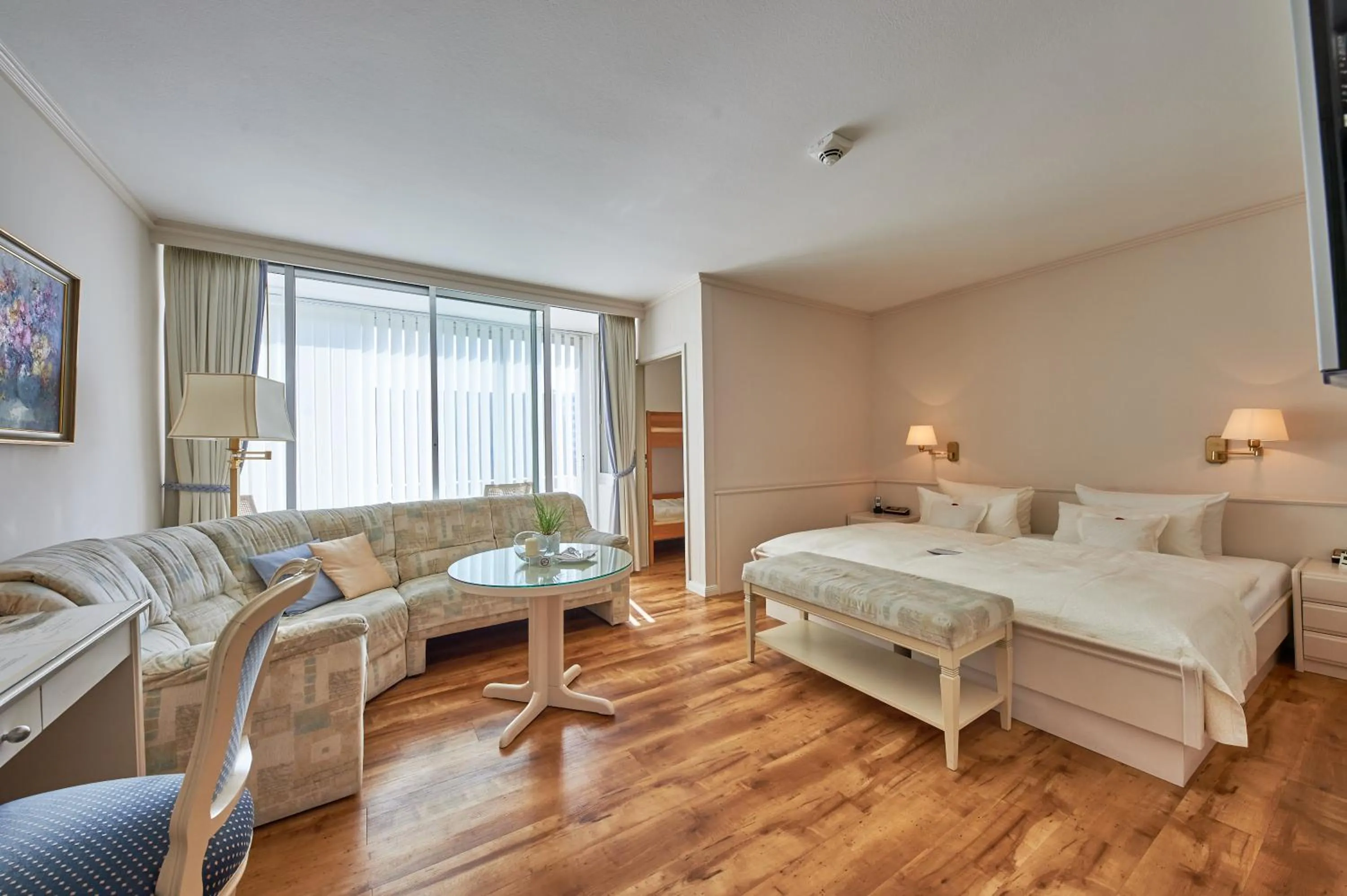 Living room, Bed in Badhotel Sternhagen