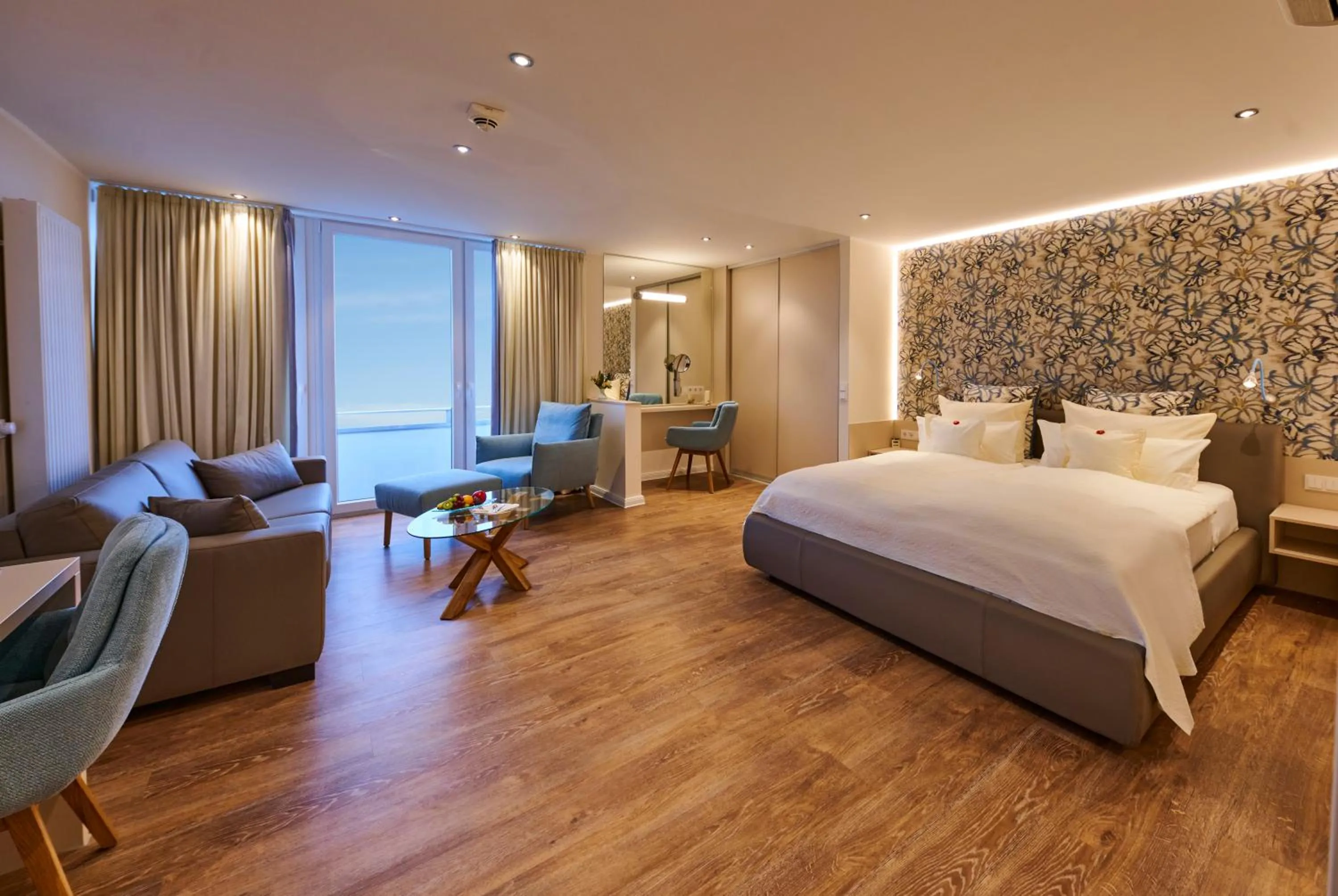 Living room, Bed in Badhotel Sternhagen