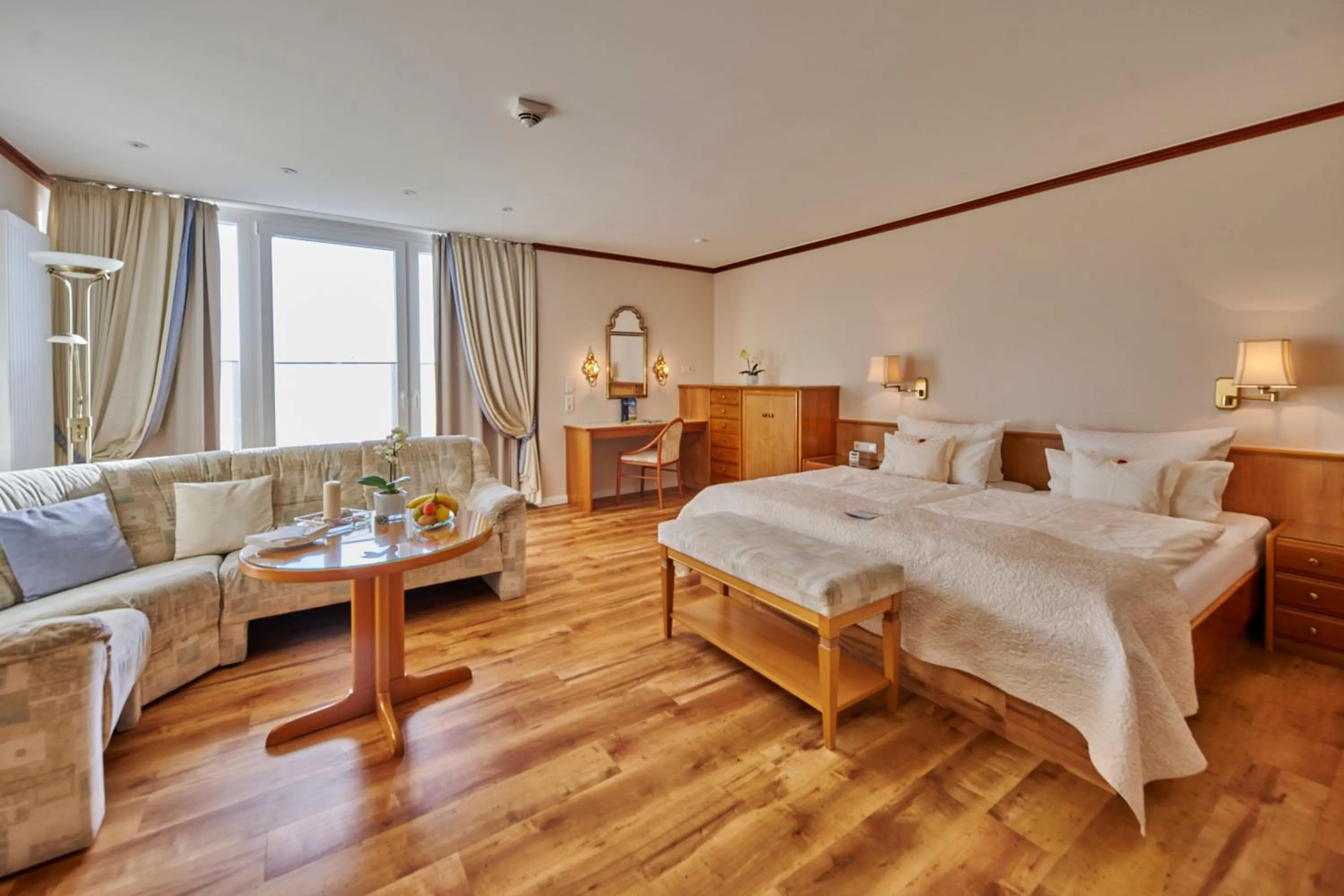 Living room, Bed in Badhotel Sternhagen