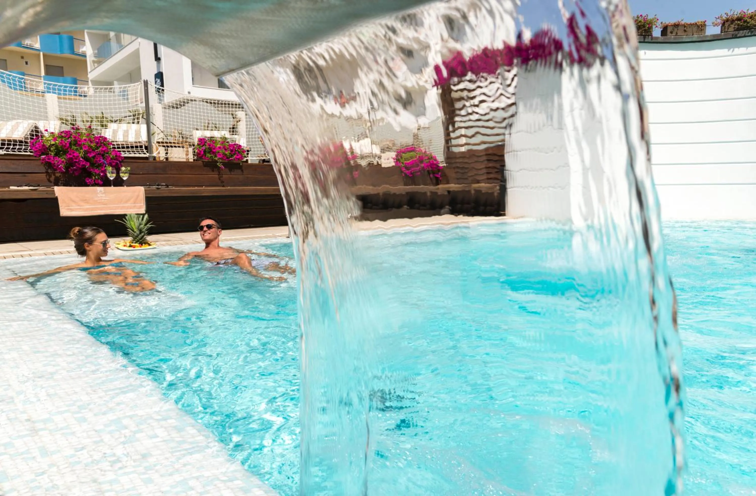 Swimming pool in Novecento Suite Hotel